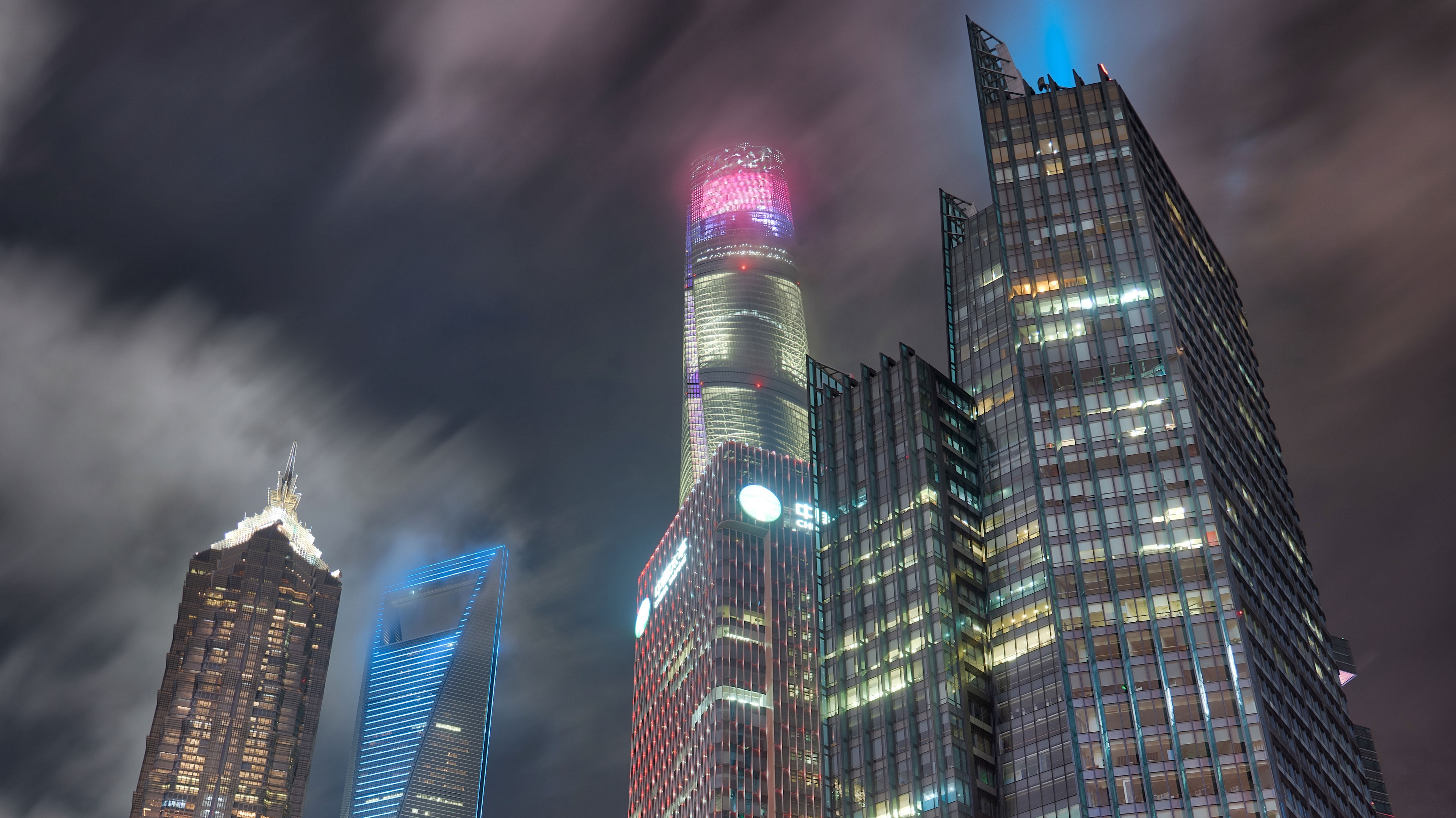 Shanghai skyscrapers at night with clouds HD Wallpaper