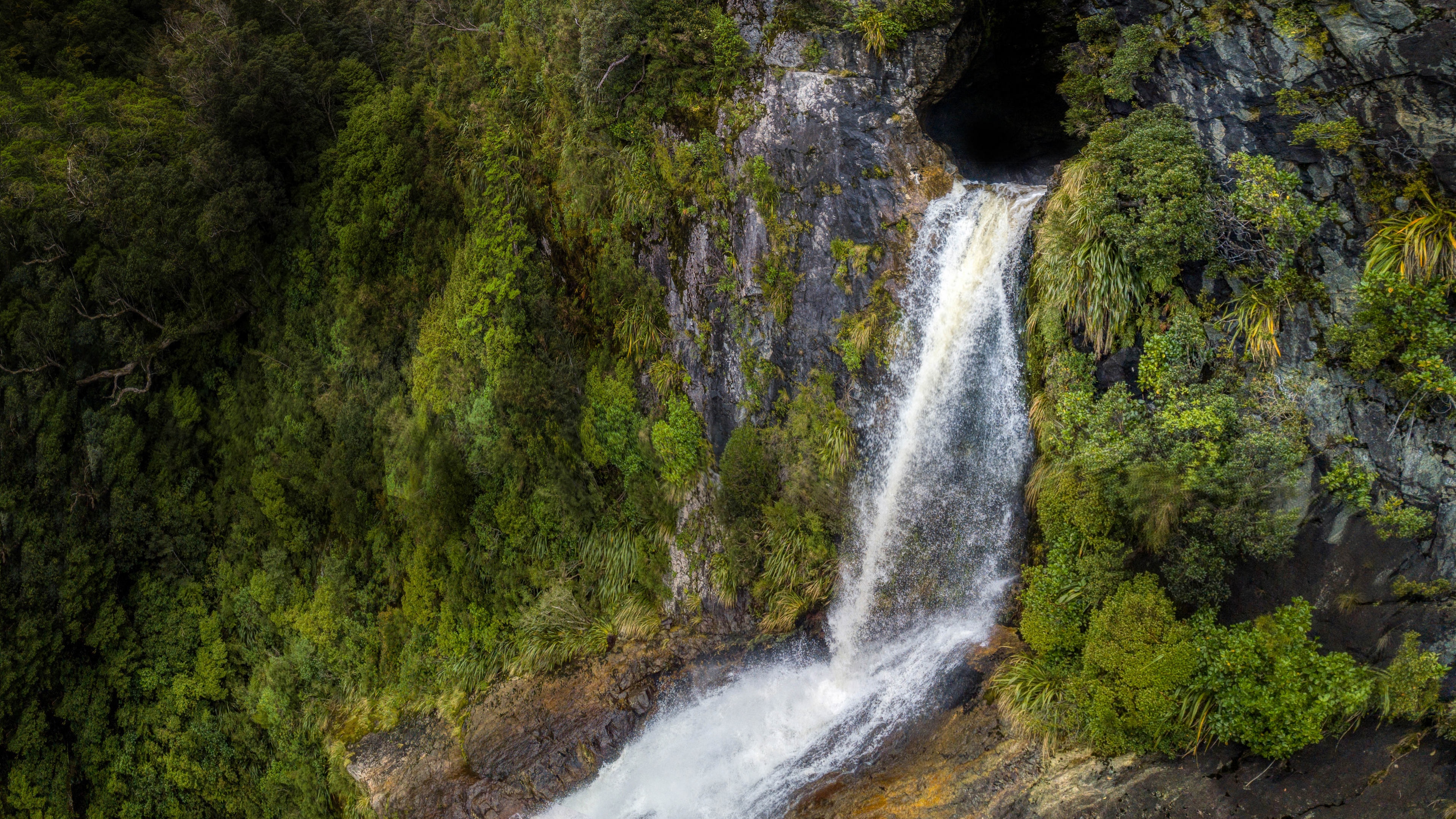 4K Waterfall in a Lush Forest HD Wallpaper