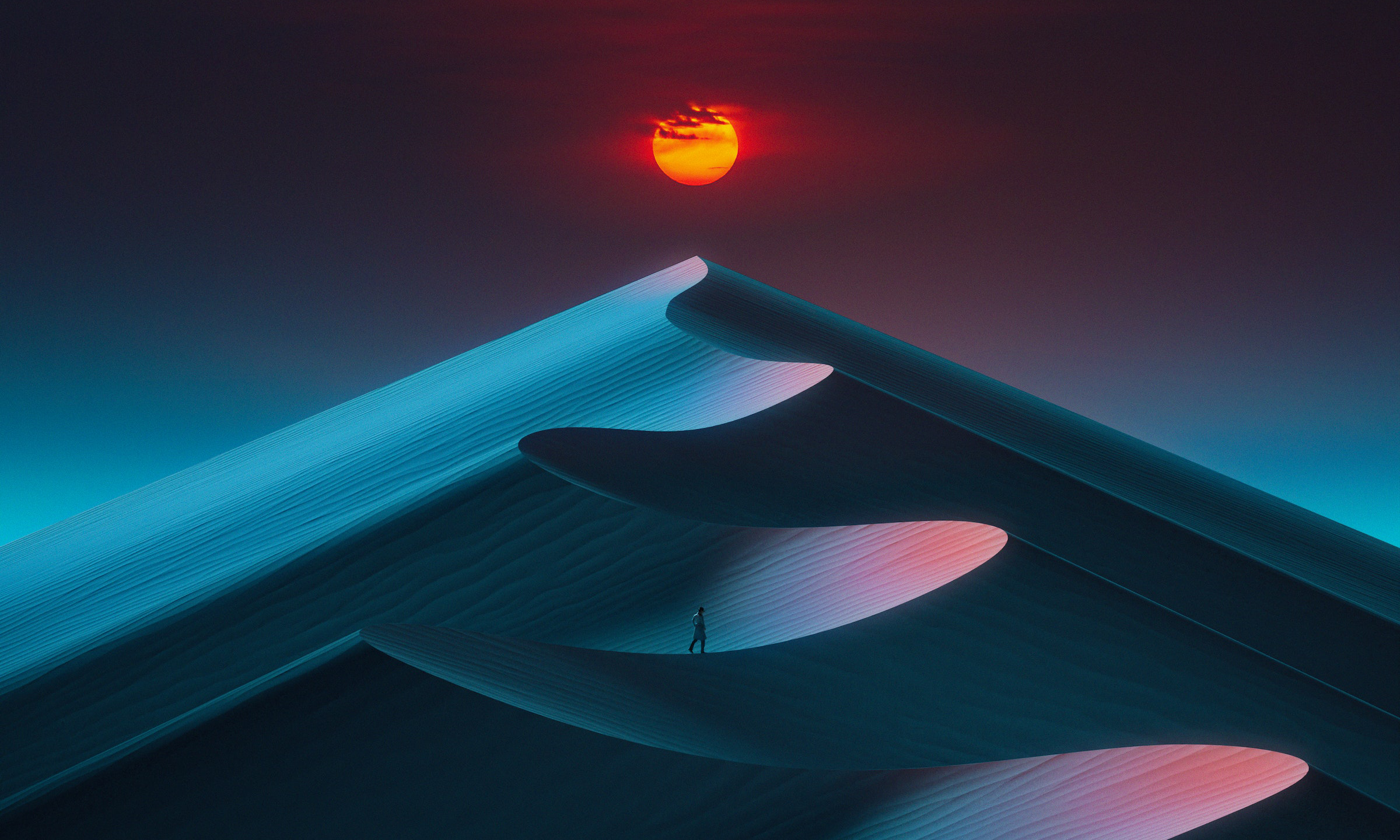 A lone figure walks across sand dunes under a red sun. HD Wallpaper