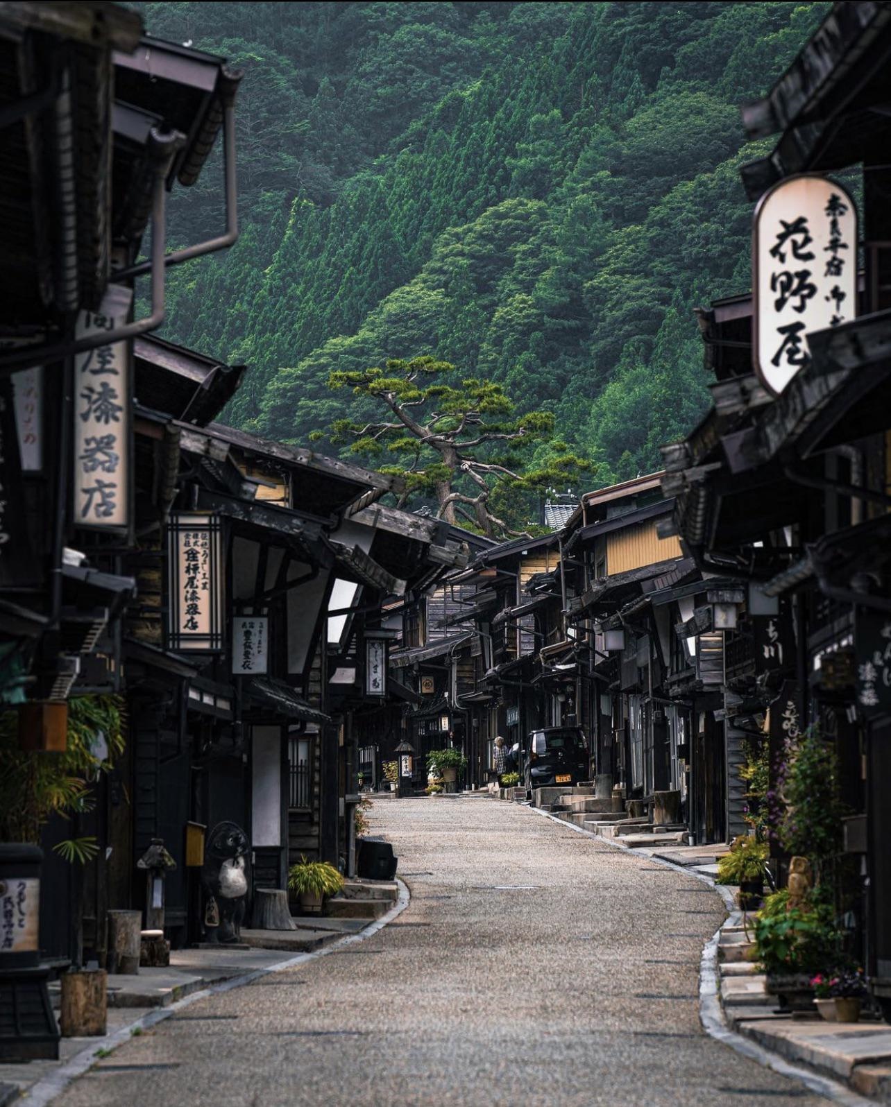 Narai-juku street with traditional Japanese architecture and forest HD Phone Wallpaper