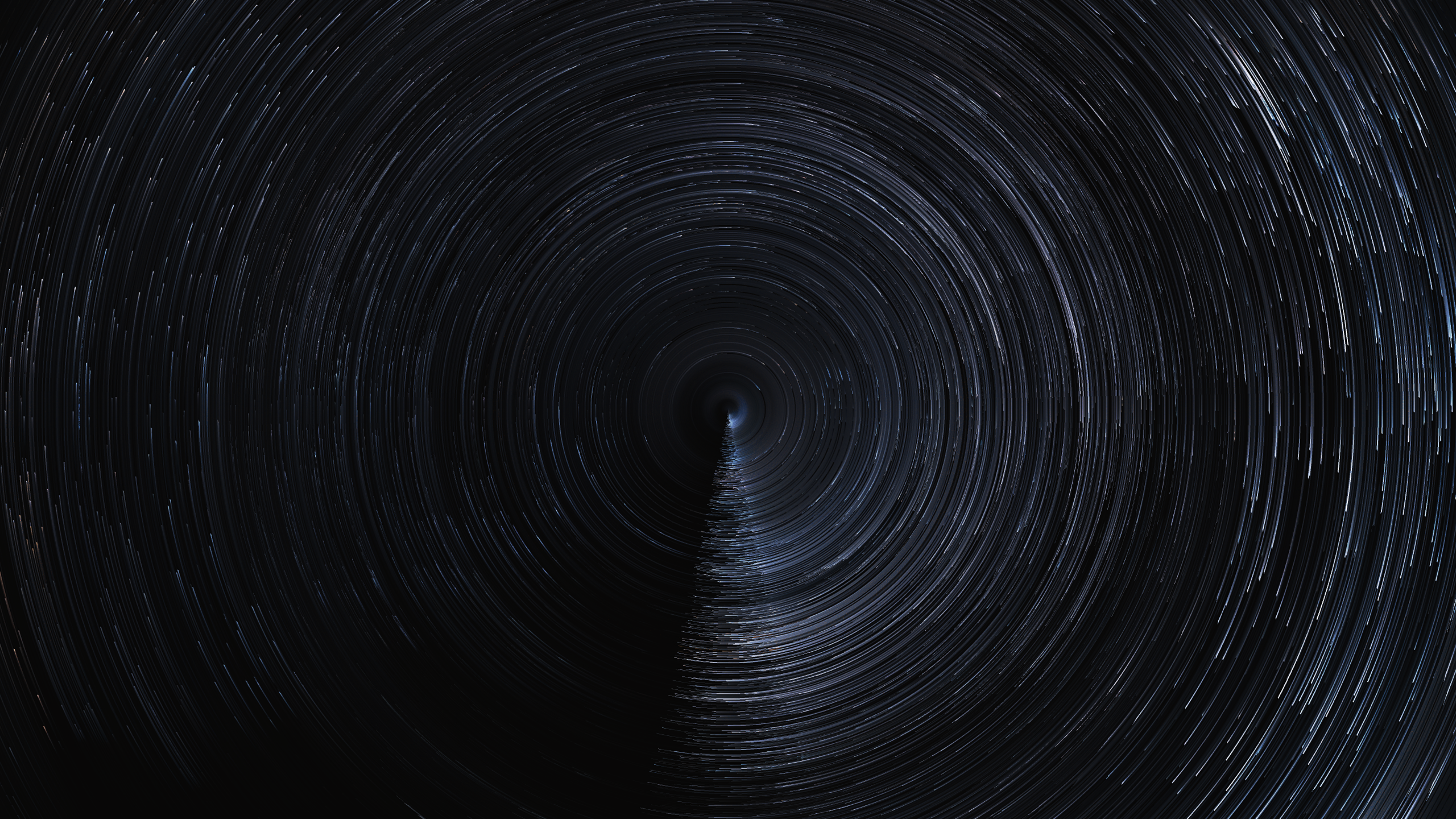 Star trails in a circular pattern HD Wallpaper