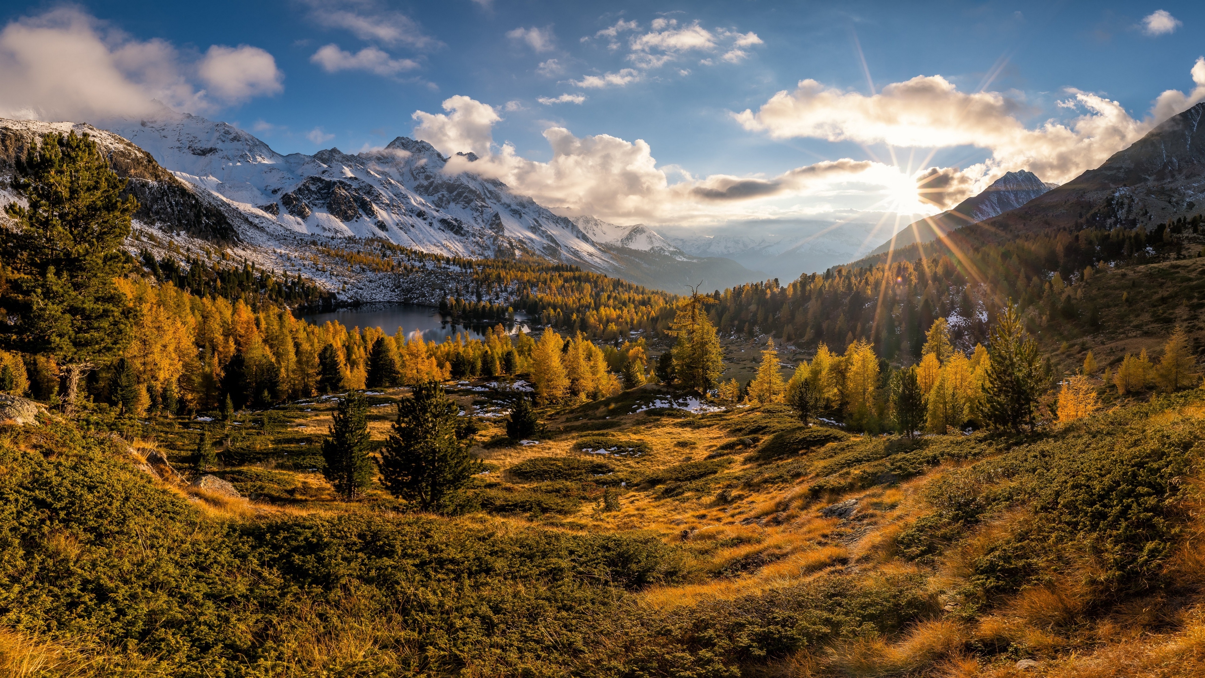 Autumn mountains with lake and sunbeams HD Wallpaper