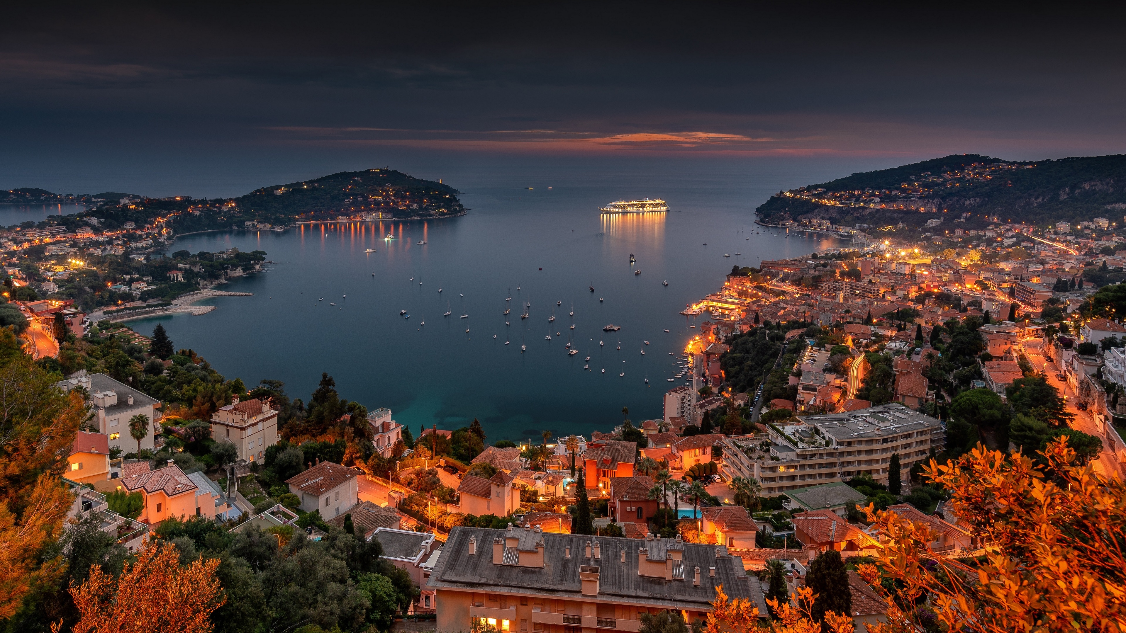 Villefranche-sur-Mer bay at sunset with city lights HD Wallpaper