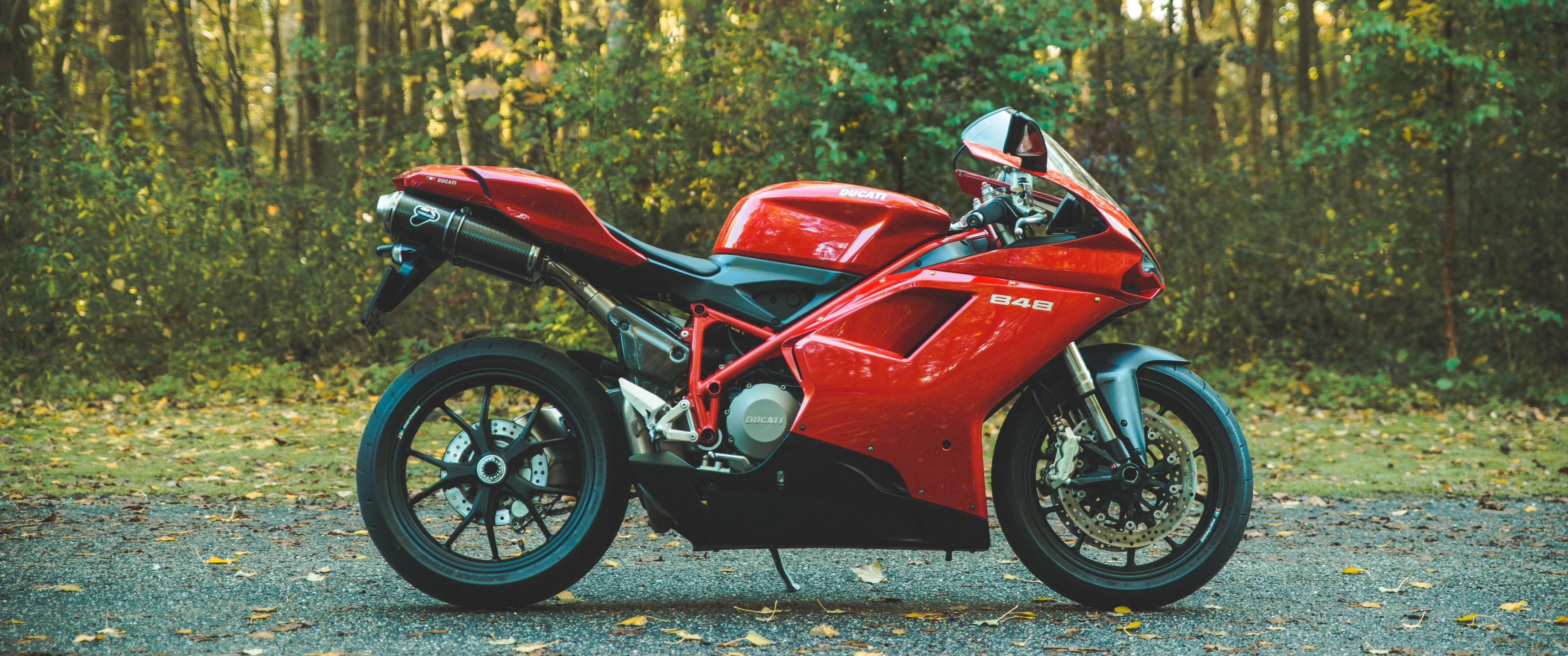 Red Ducati 848 Motorcycle in Forest HD Wallpaper