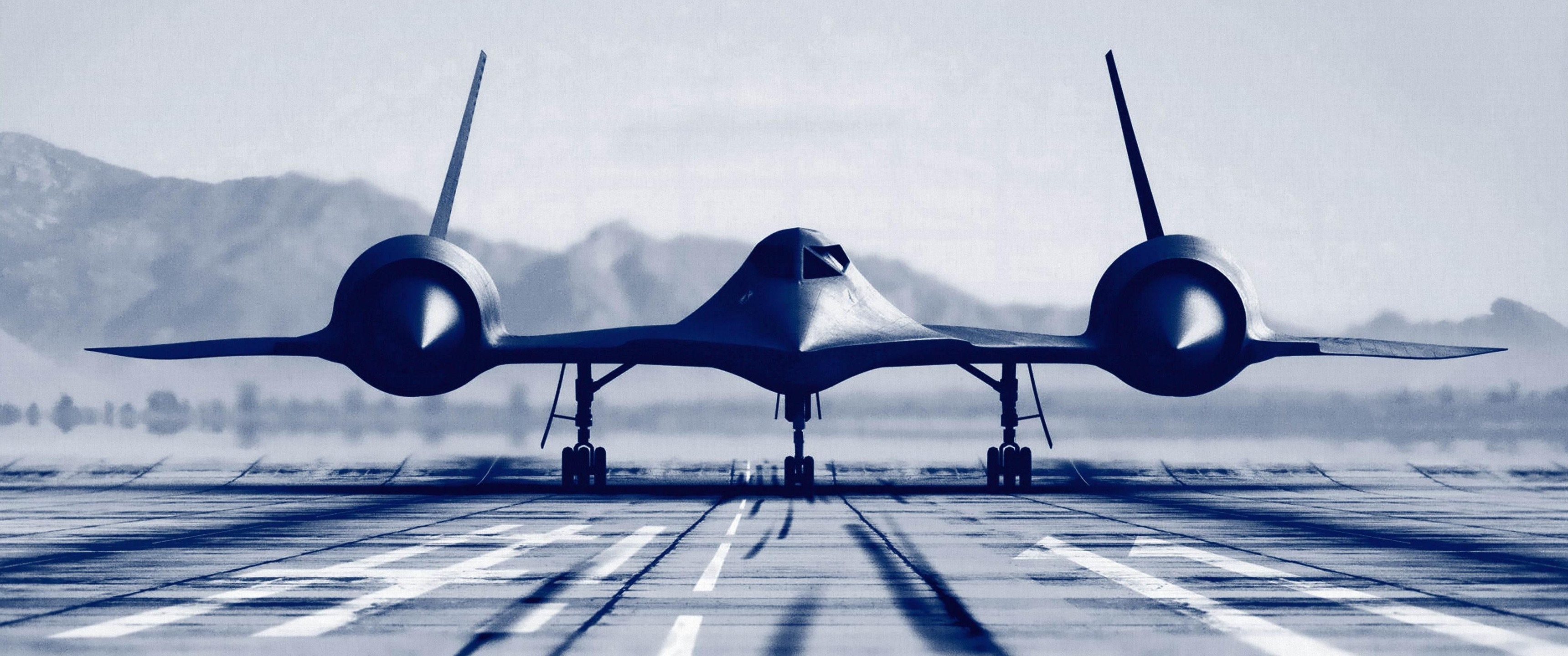 Lockheed SR-71 Blackbird on a runway HD Wallpaper