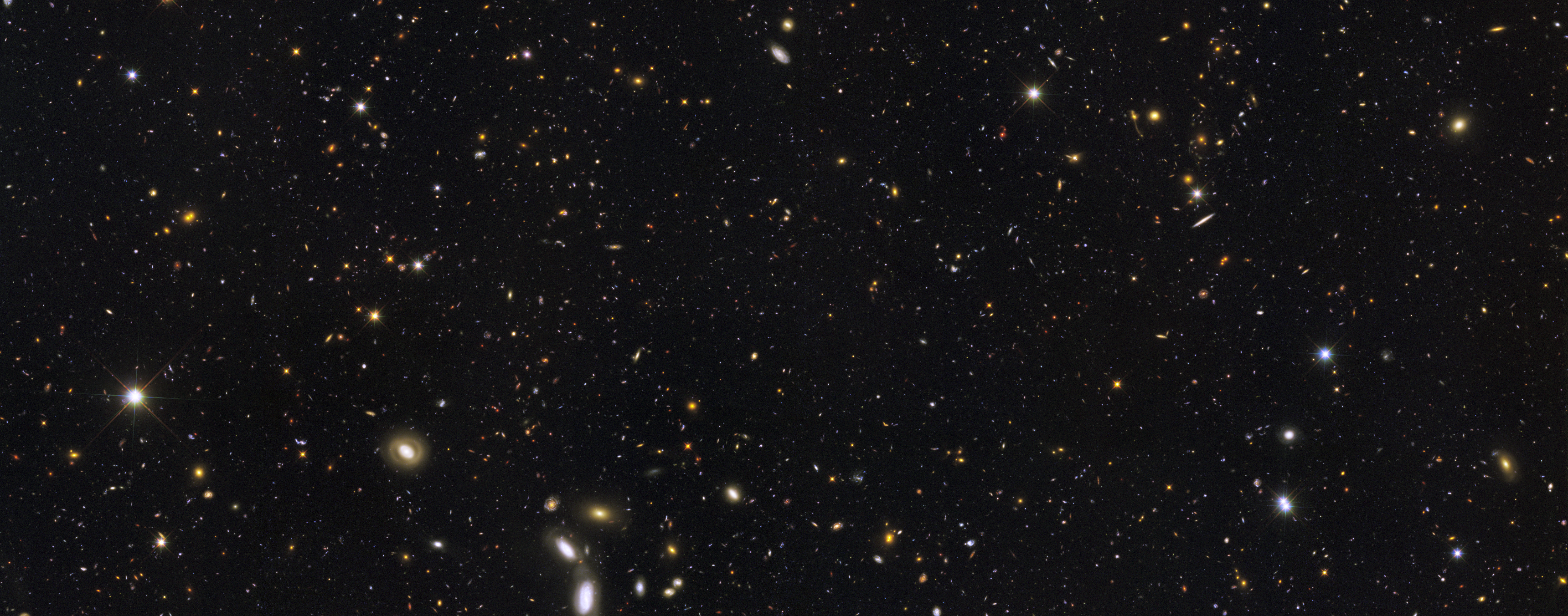 Deep space view of distant galaxies and stars HD Wallpaper