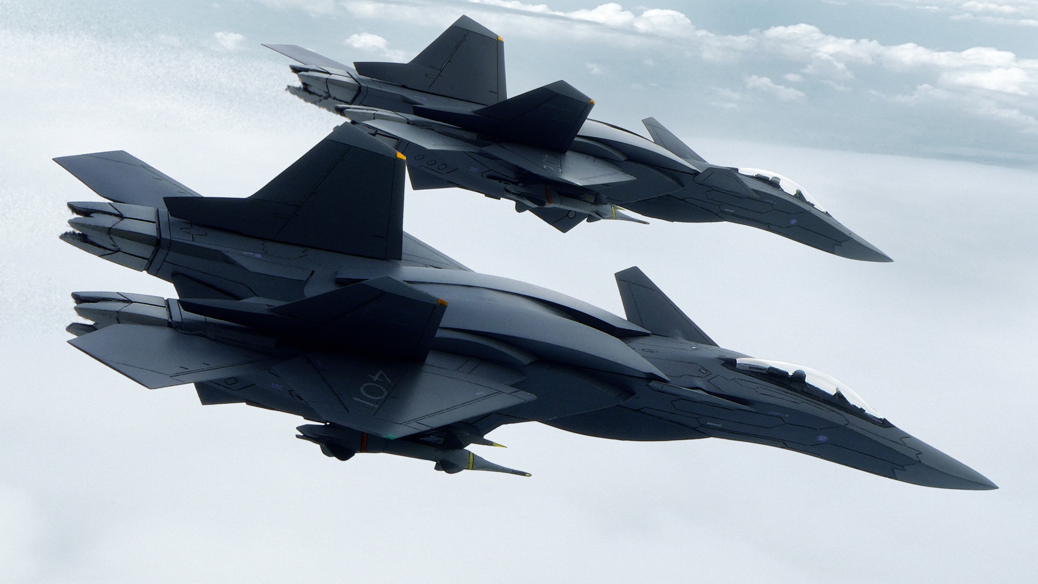 Two futuristic military aircraft flying in the sky HD Wallpaper