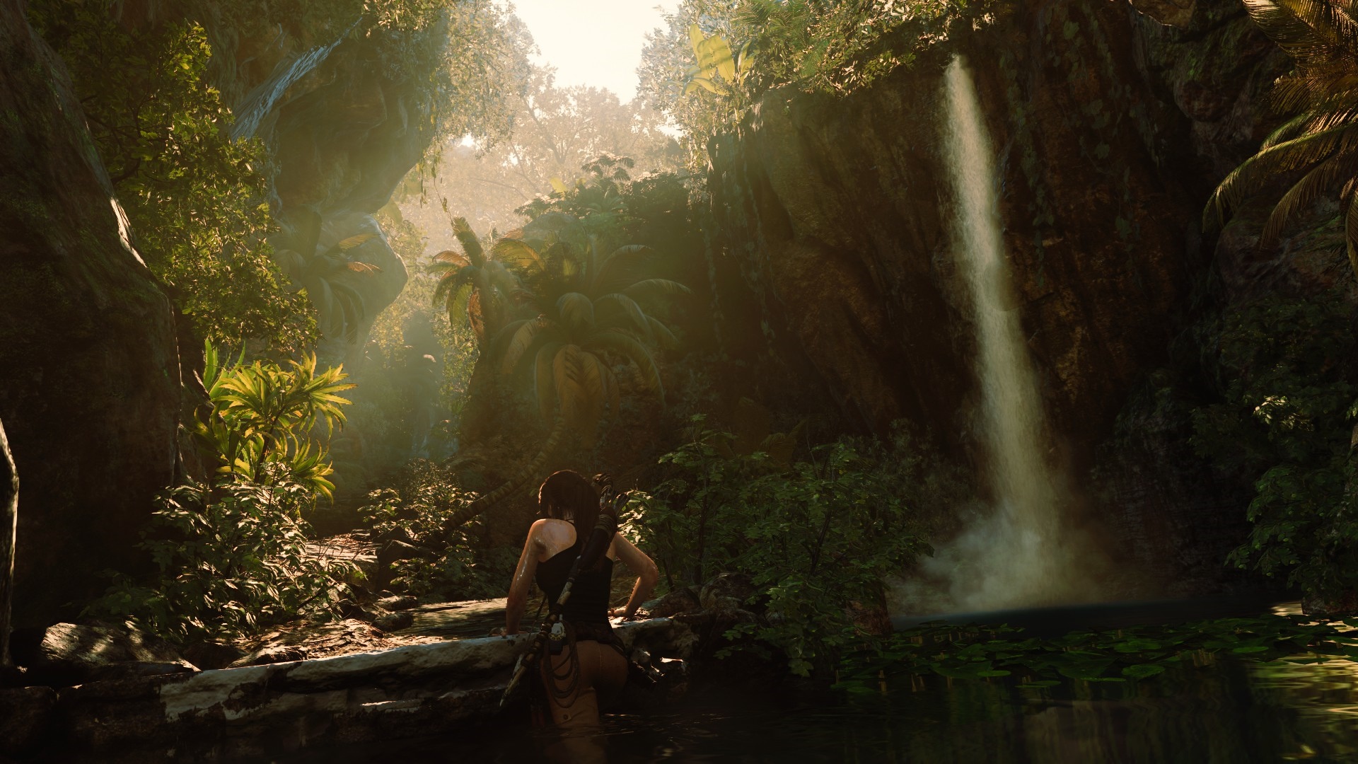 Lara Croft in a jungle with a waterfall HD Wallpaper