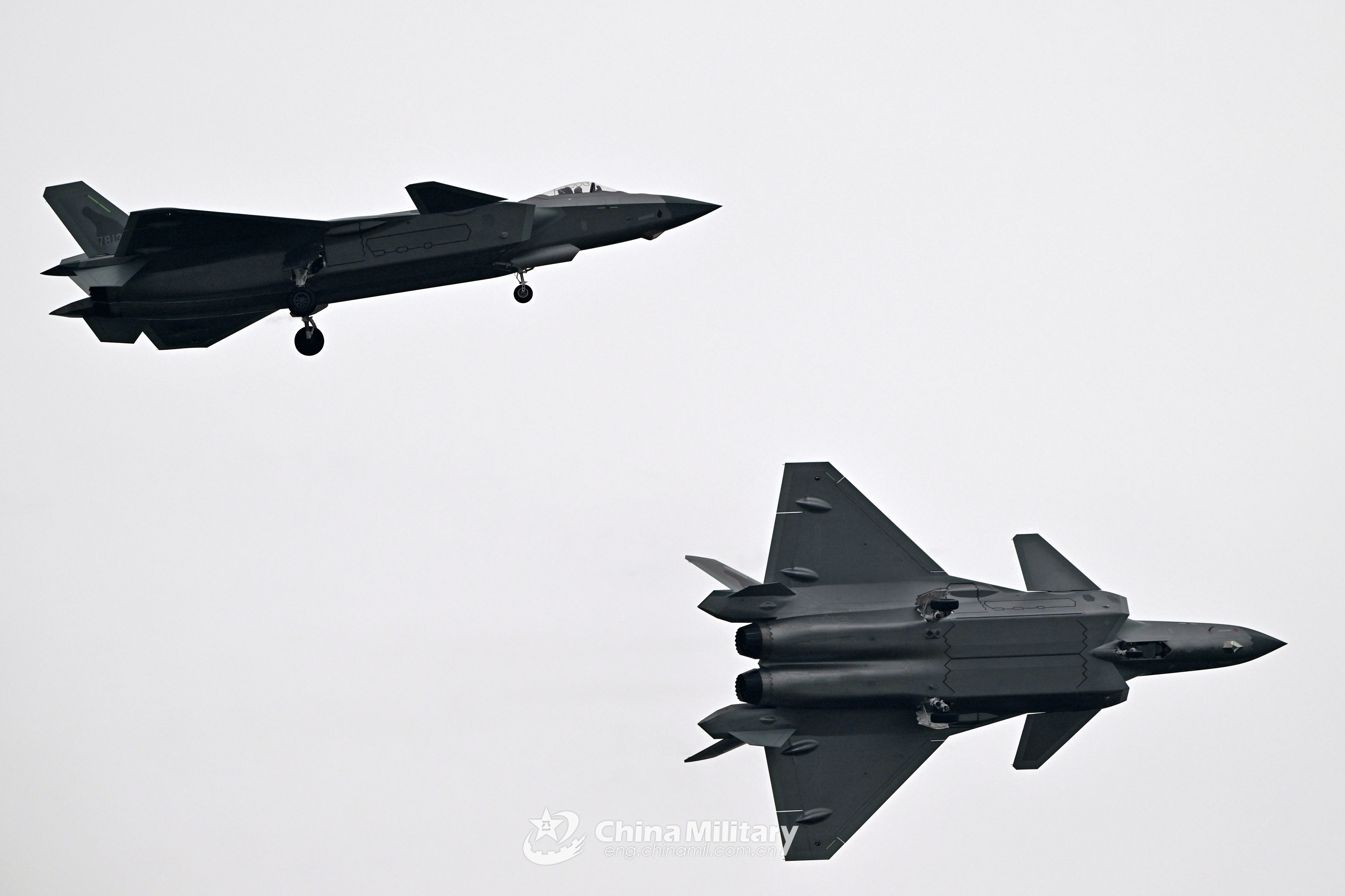 Two Chengdu J-20 fighter jets in flight HD Wallpaper