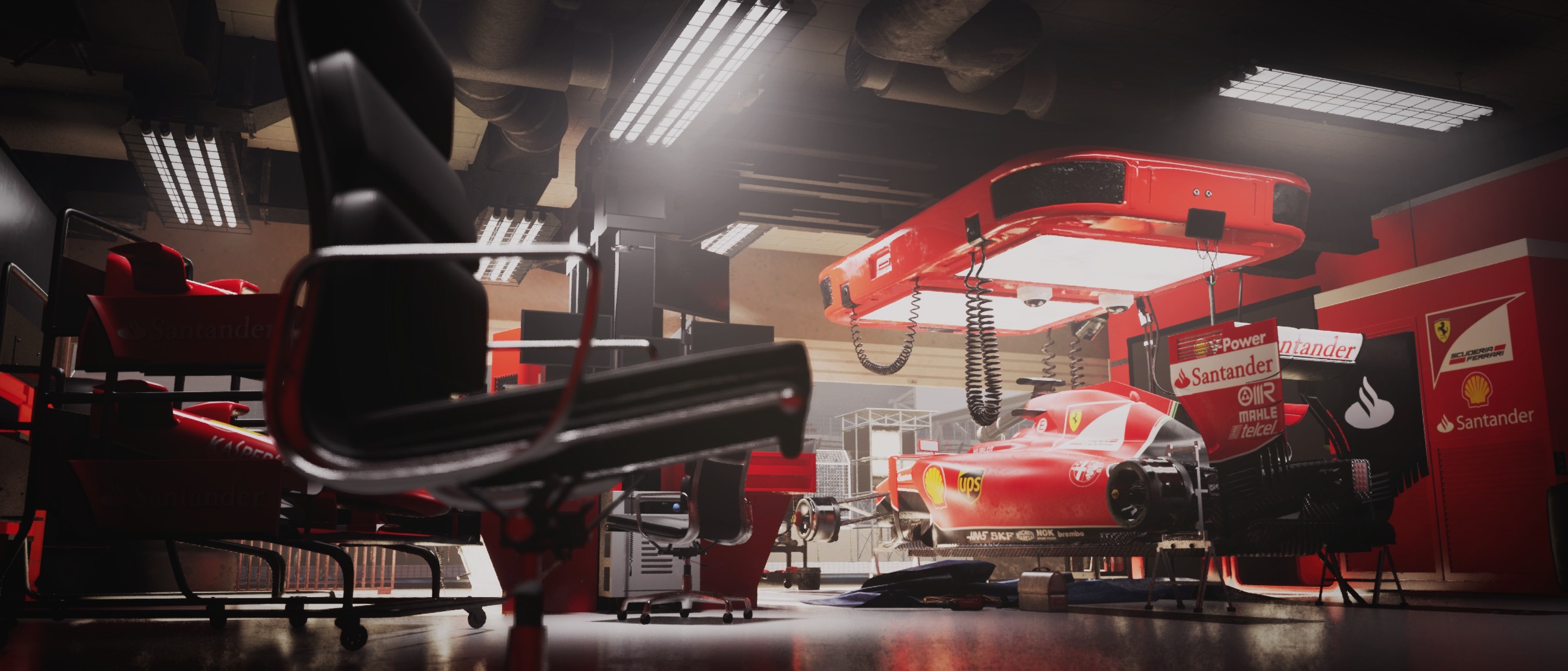Ferrari Formula 1 garage with cars and equipment HD Wallpaper