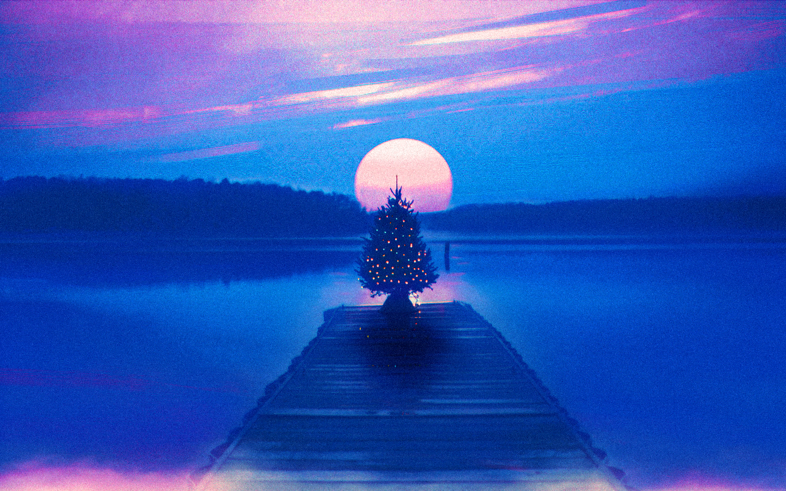 Christmas tree on a dock at sunset with a large sun HD Wallpaper