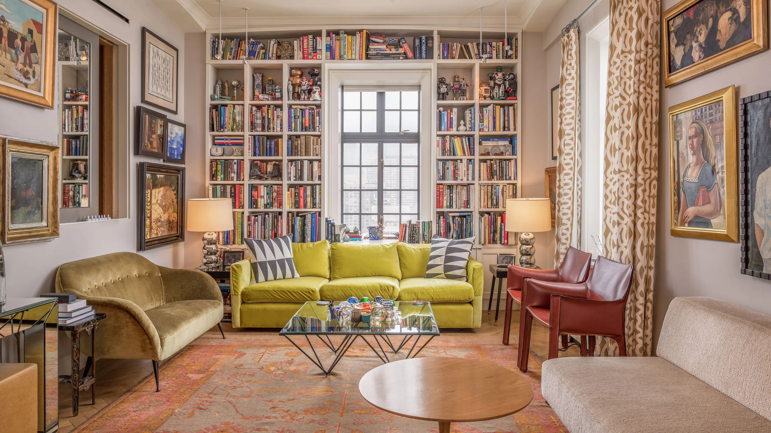 Living room with bookshelves and furniture HD Wallpaper