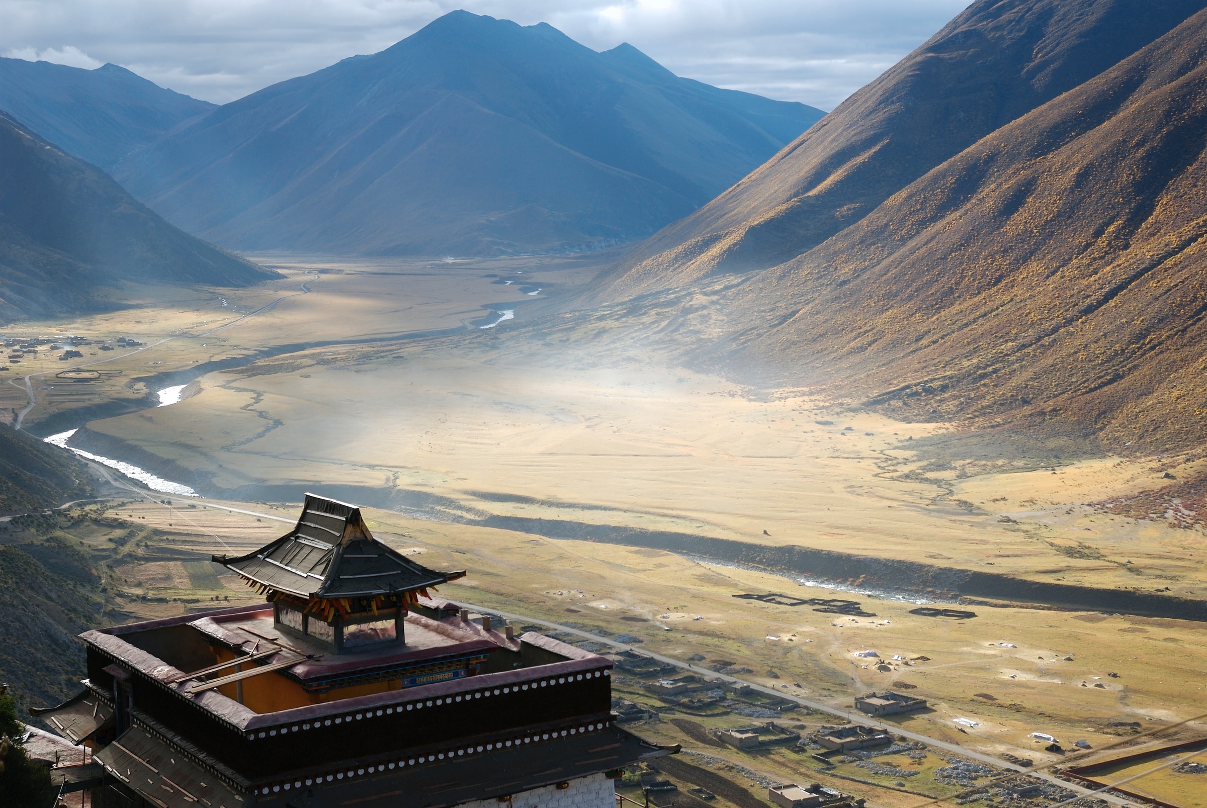 Monastery in a Tibetan Valley with Mountains HD Wallpaper