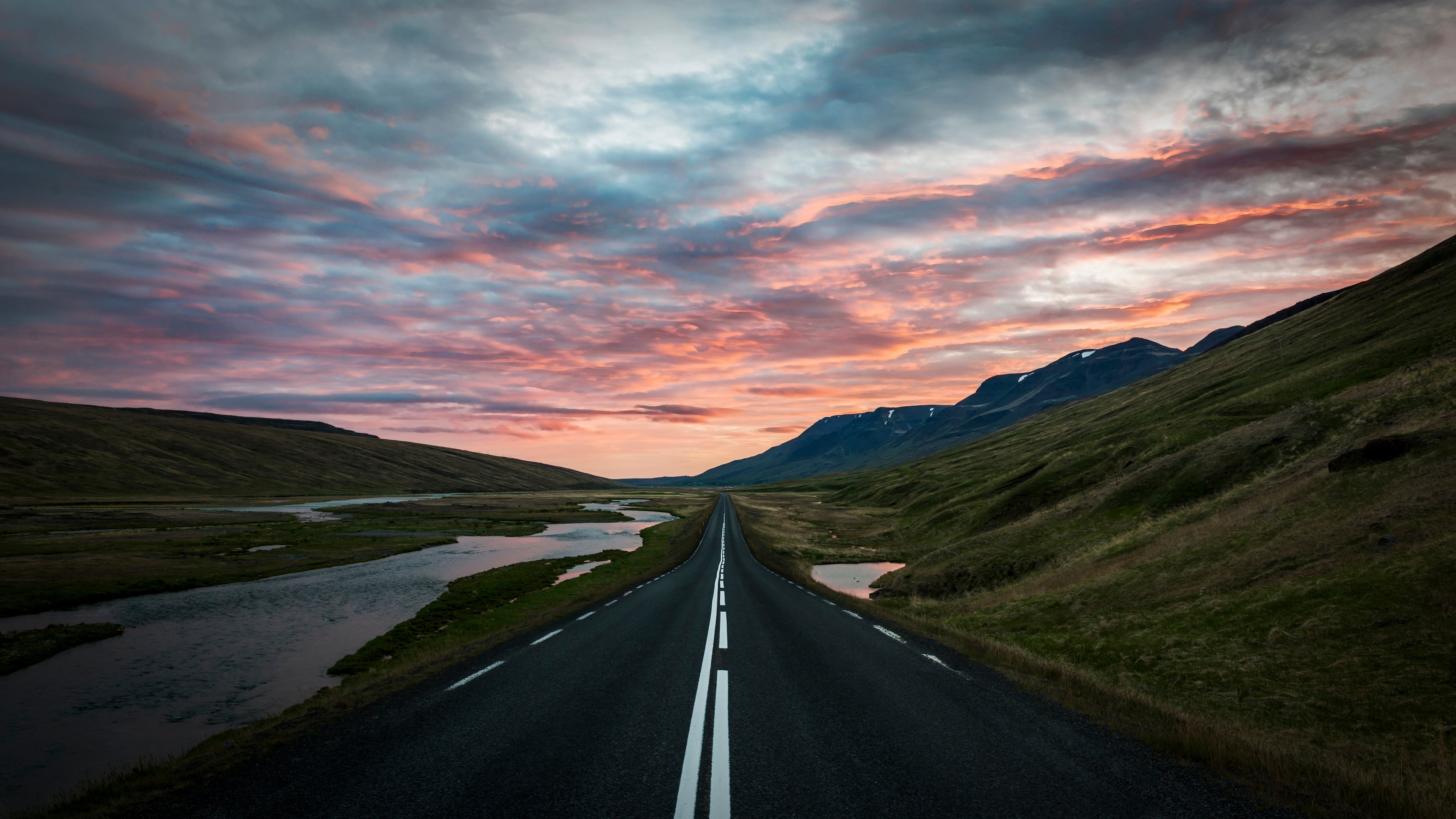 Road through Iceland landscape at sunset HD Wallpaper