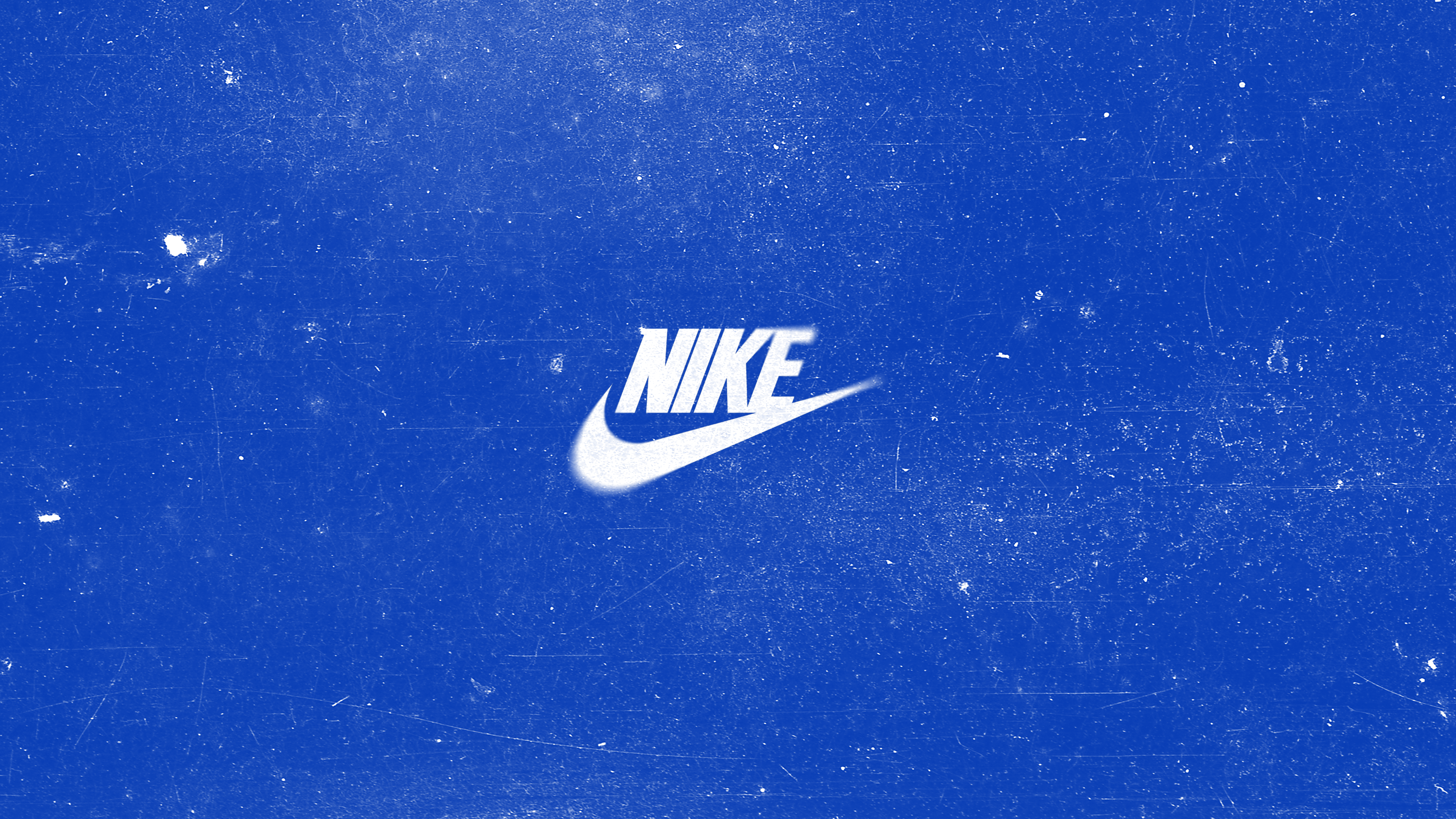 Nike logo on a blue grunge texture HD Wallpaper
