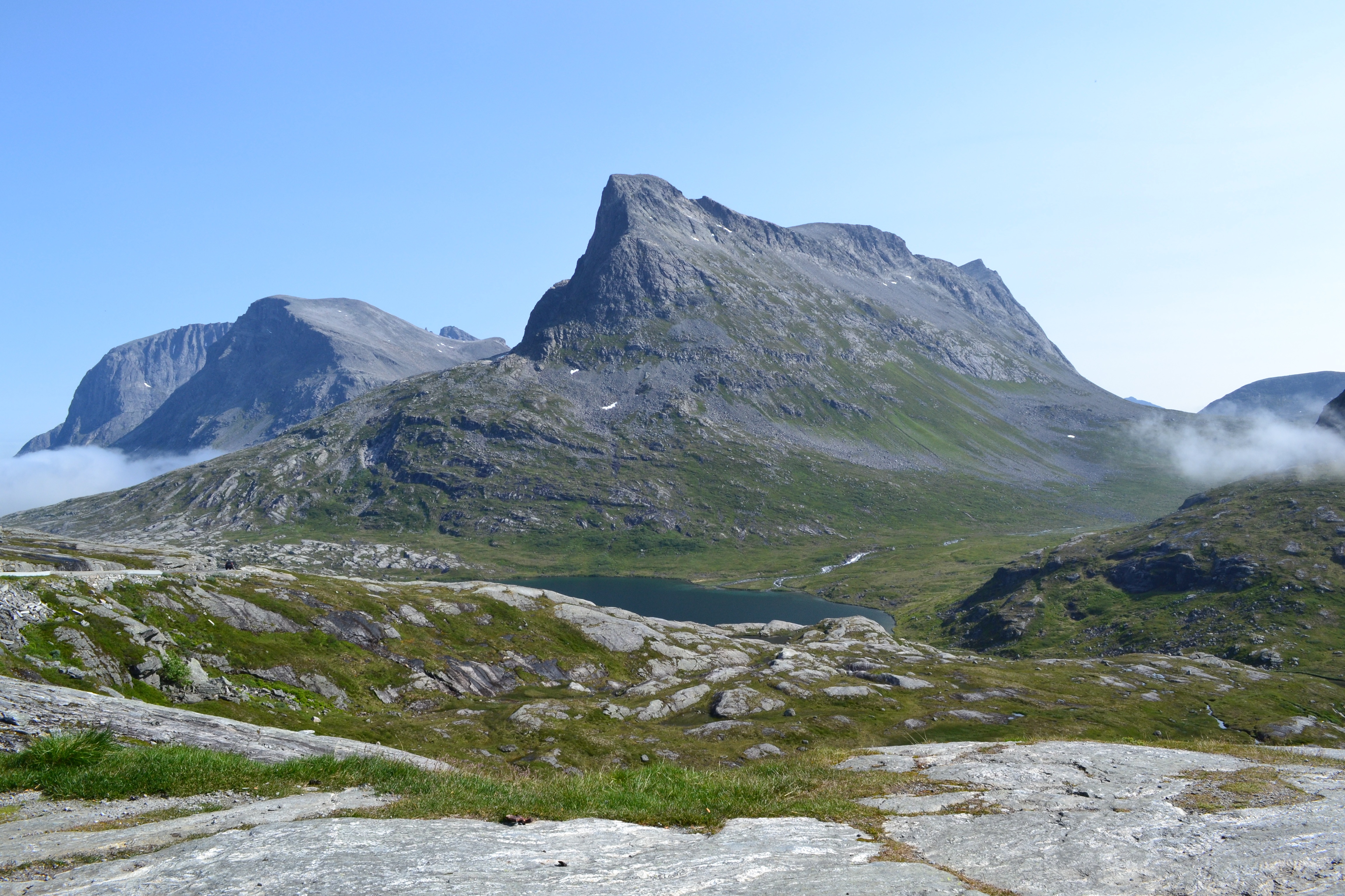 4K Norway mountains with clouds and a lake HD Wallpaper