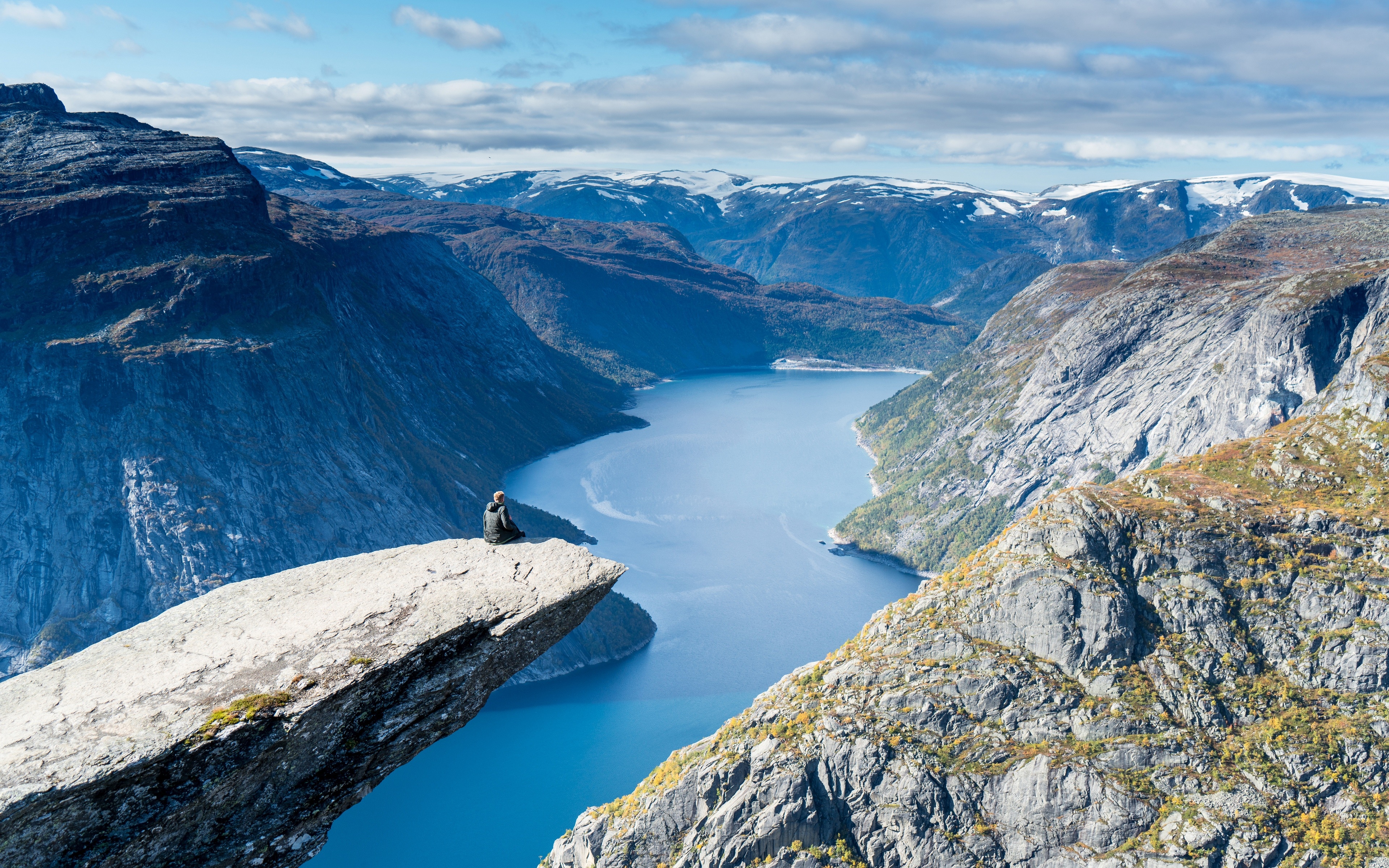 4K Norway Landscape with Person on Trolltunga Rock HD Wallpaper