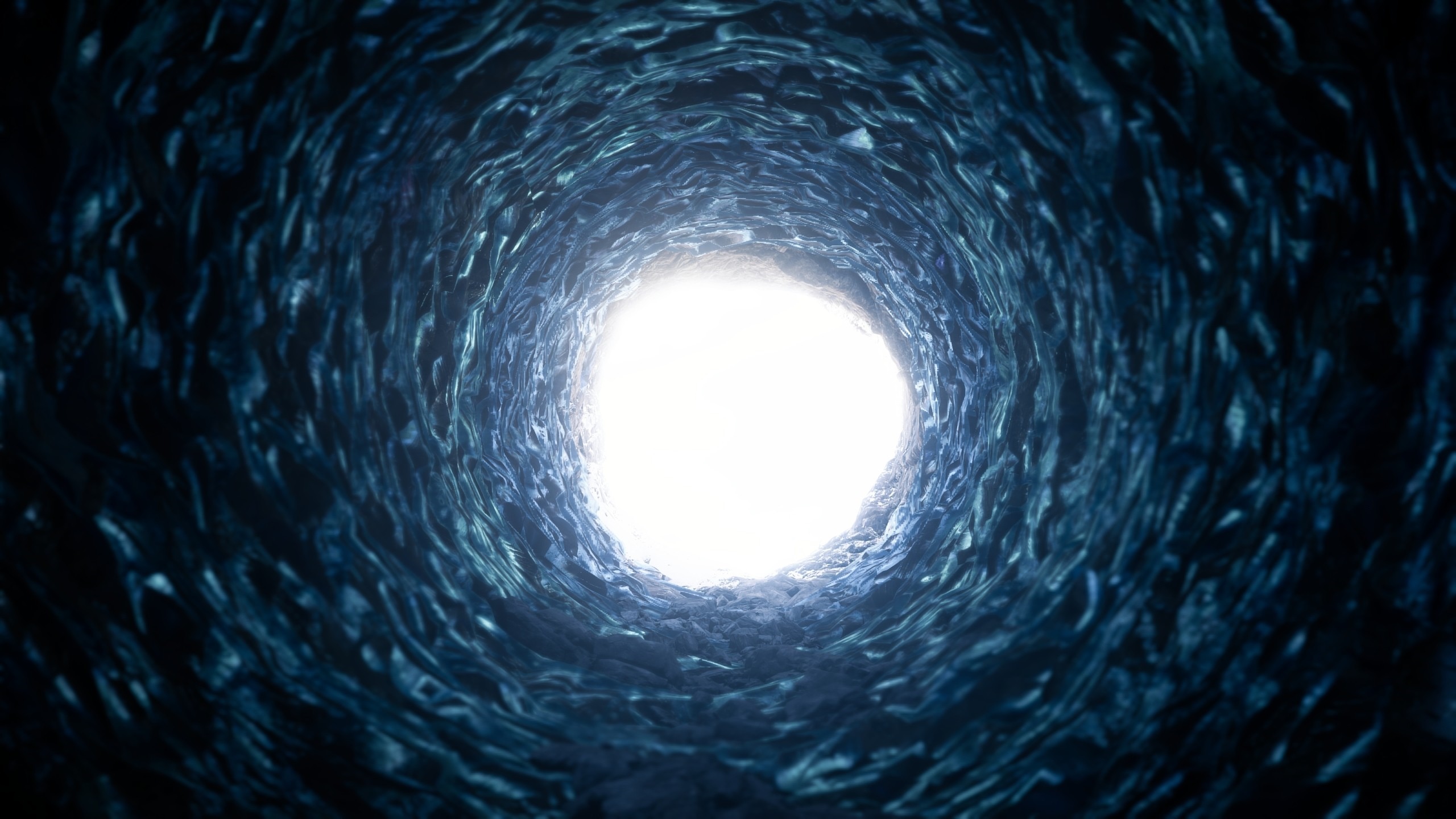 A dark tunnel with bright light at the end HD Wallpaper
