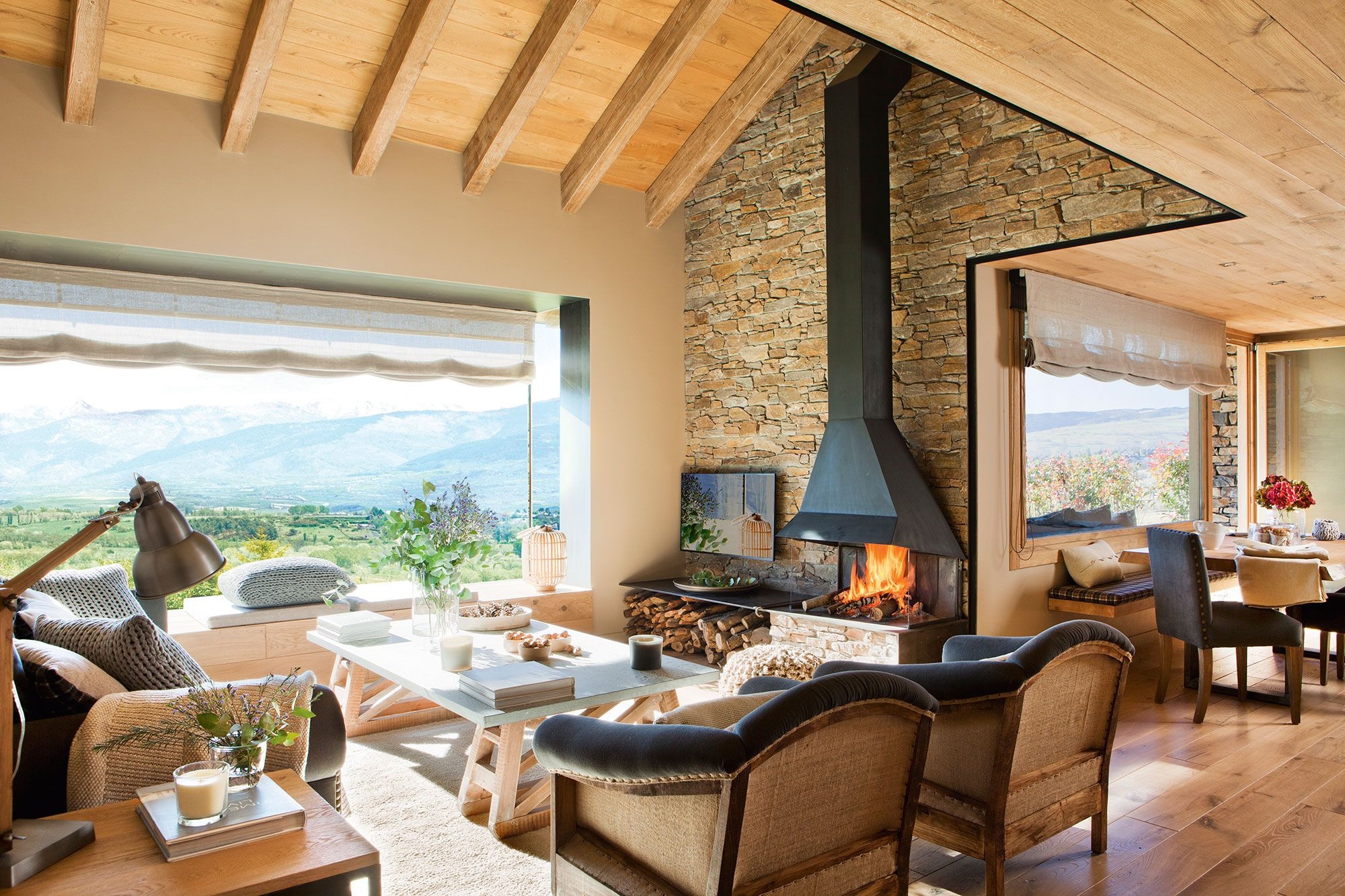 Living room with fireplace and mountain view HD Wallpaper