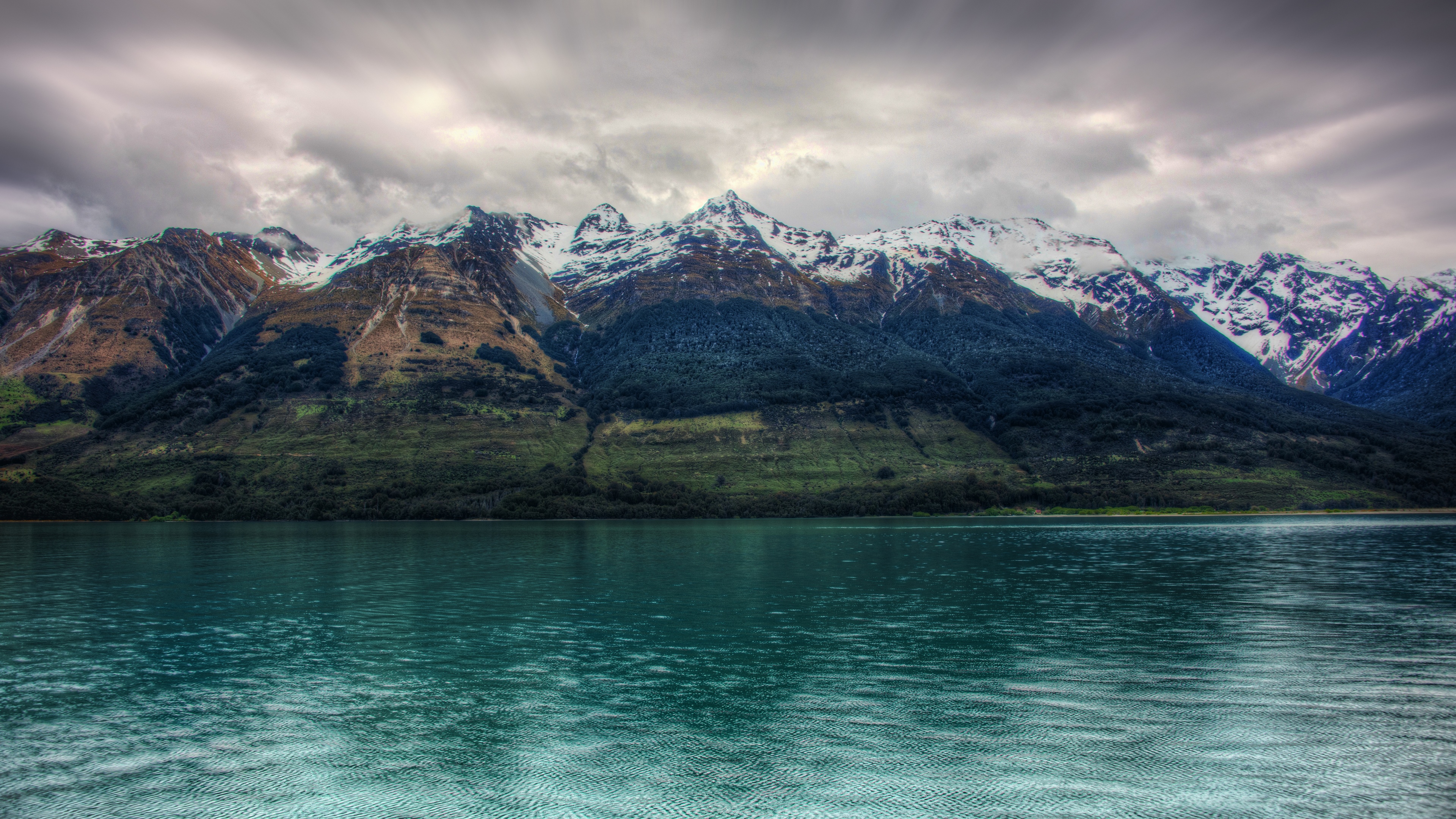 Snow-capped mountains over a lake in New Zealand HD Wallpaper