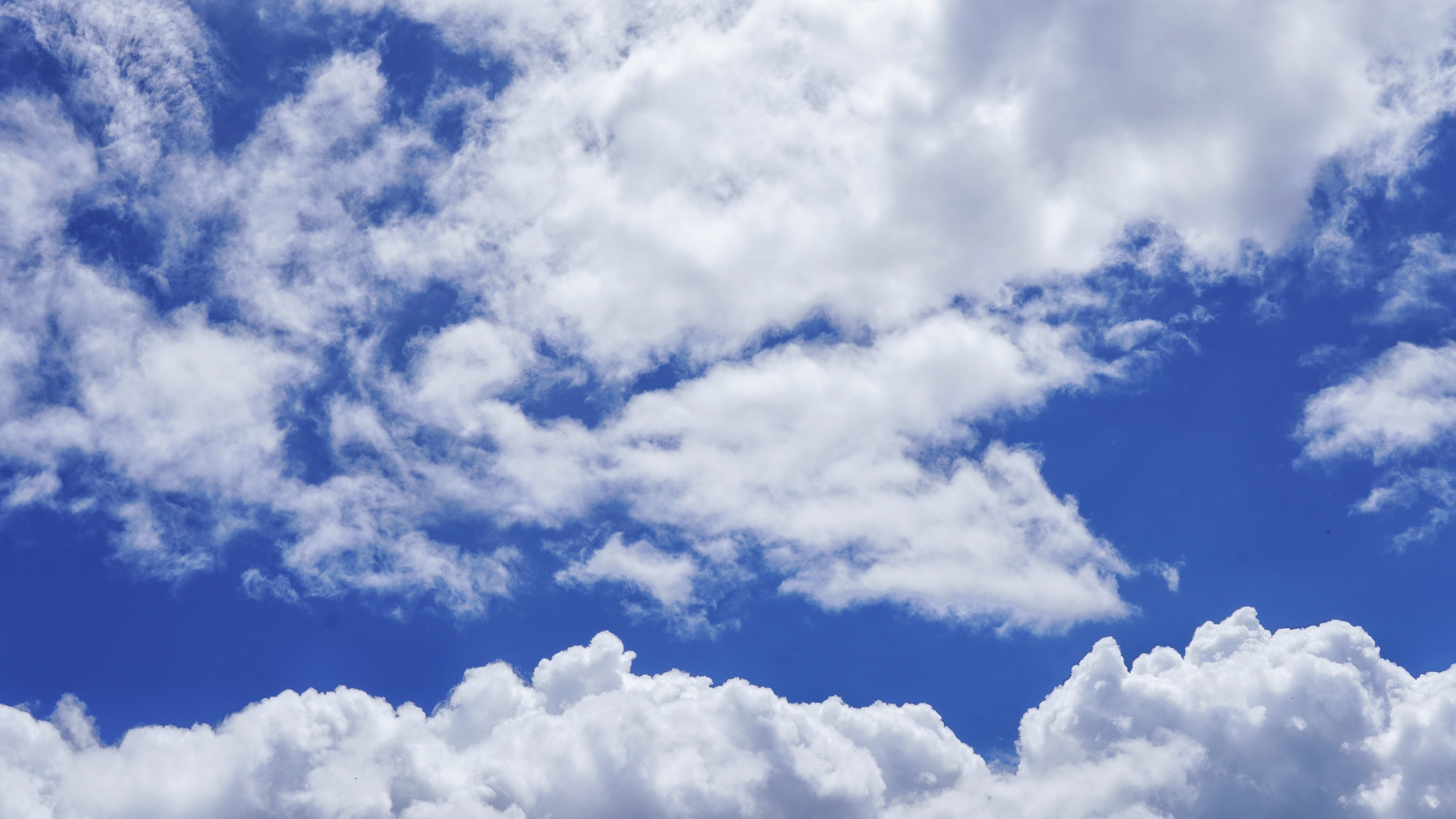 4K blue sky with white clouds HD Wallpaper