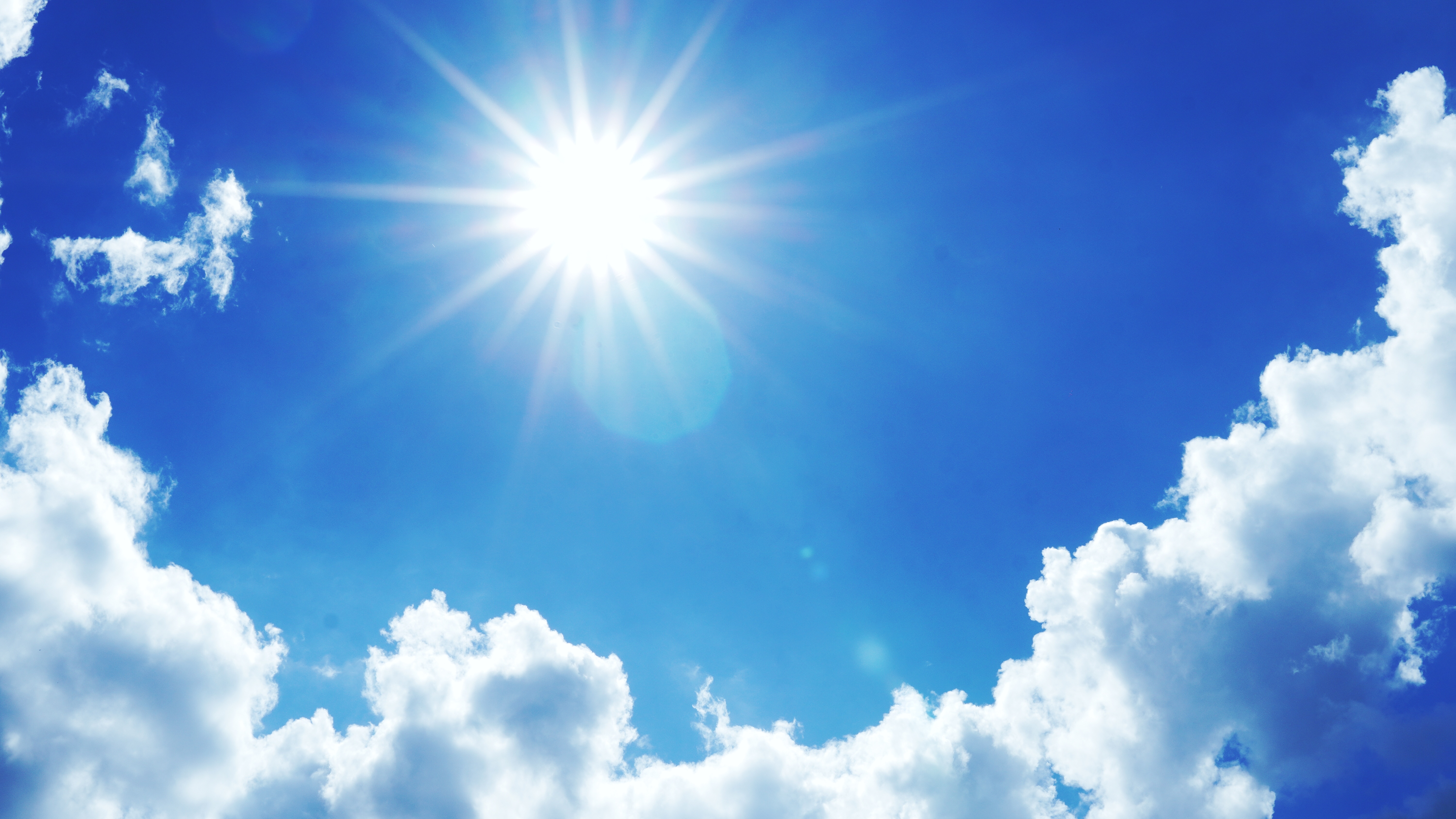 4K bright sun and clouds in blue sky HD Wallpaper