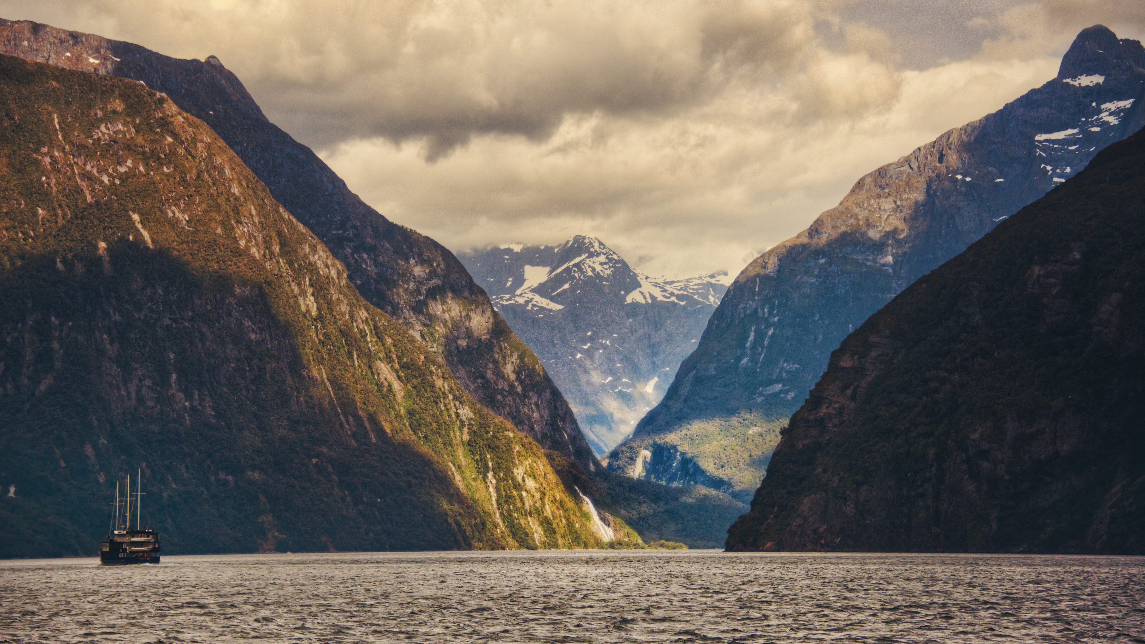 4K landscape of mountains and a ship in New Zealand HD Wallpaper