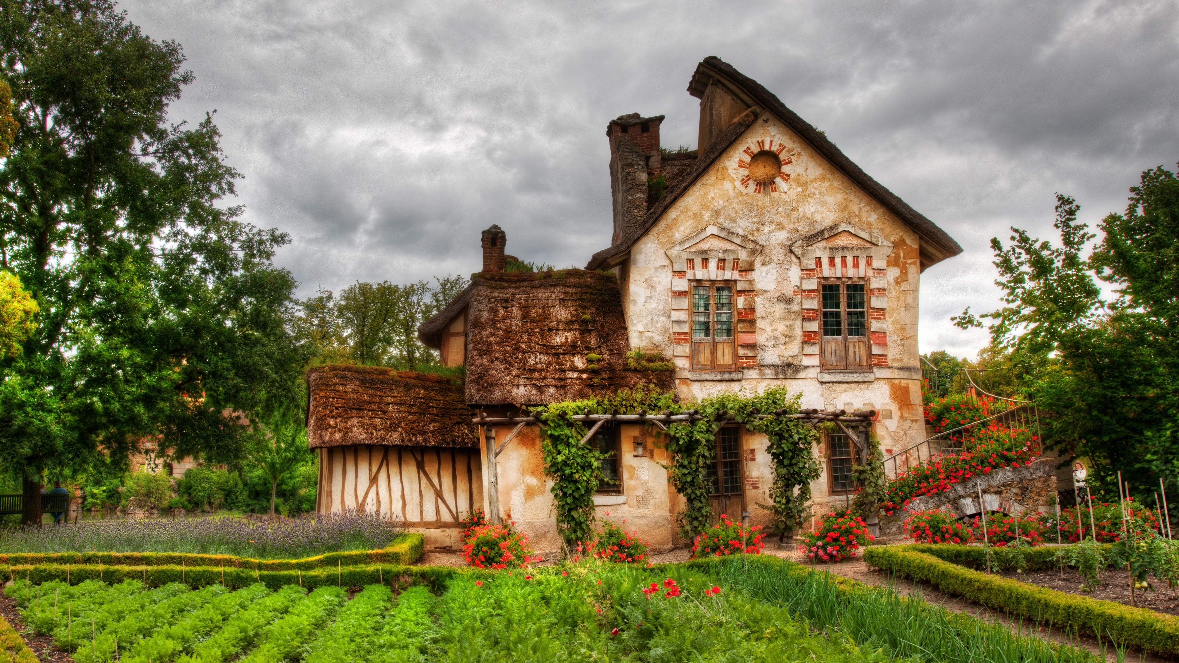 4K image of a rustic house and garden in France HD Wallpaper