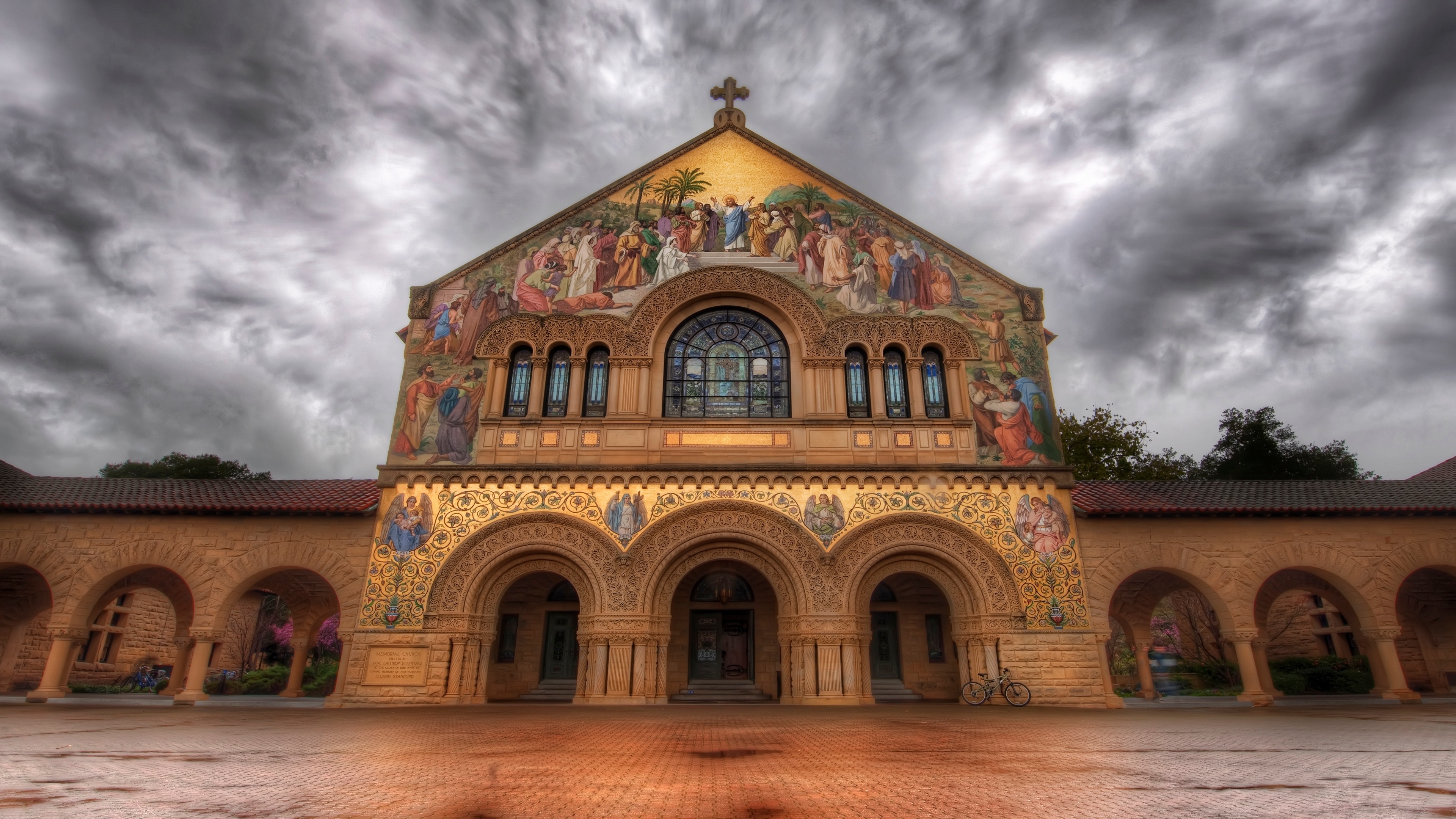 Stanford Memorial Church under cloudy skies HD Wallpaper