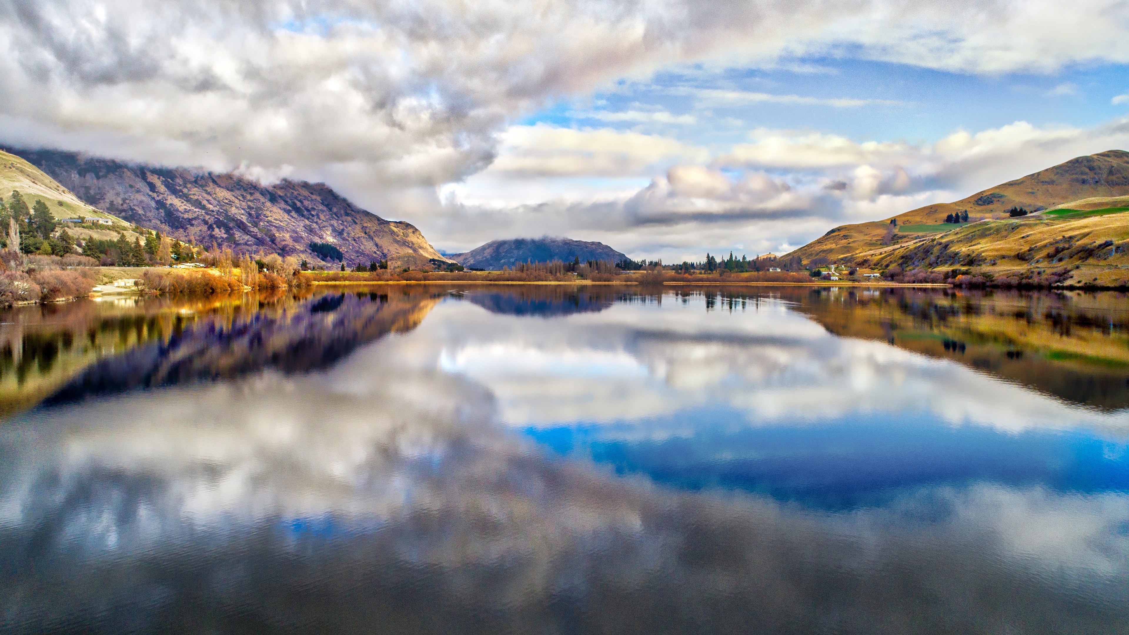 4K reflection of mountains and clouds over a lake in New Zealand HD Wallpaper