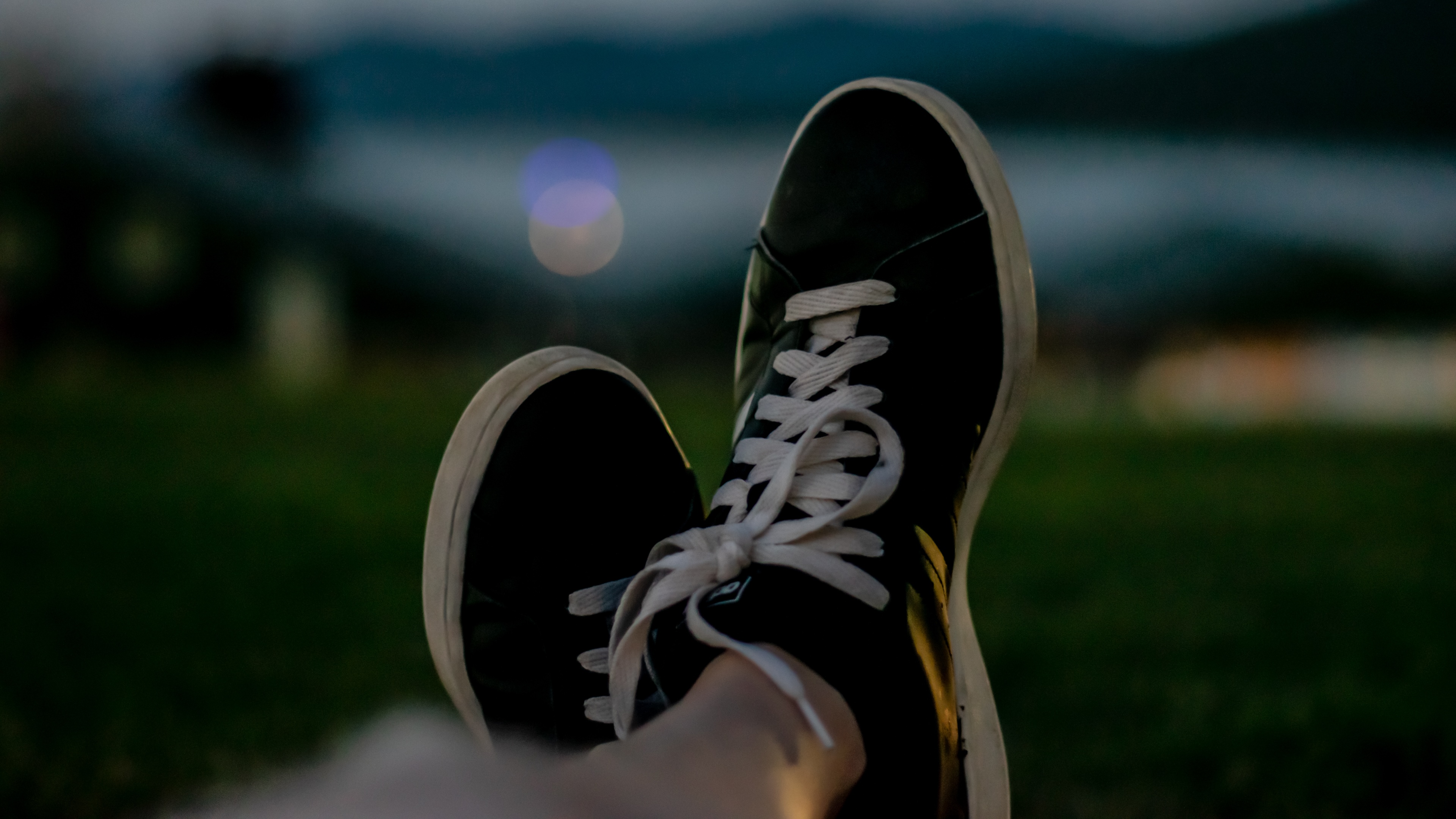 4K close-up of black Adidas shoes with white laces HD Wallpaper