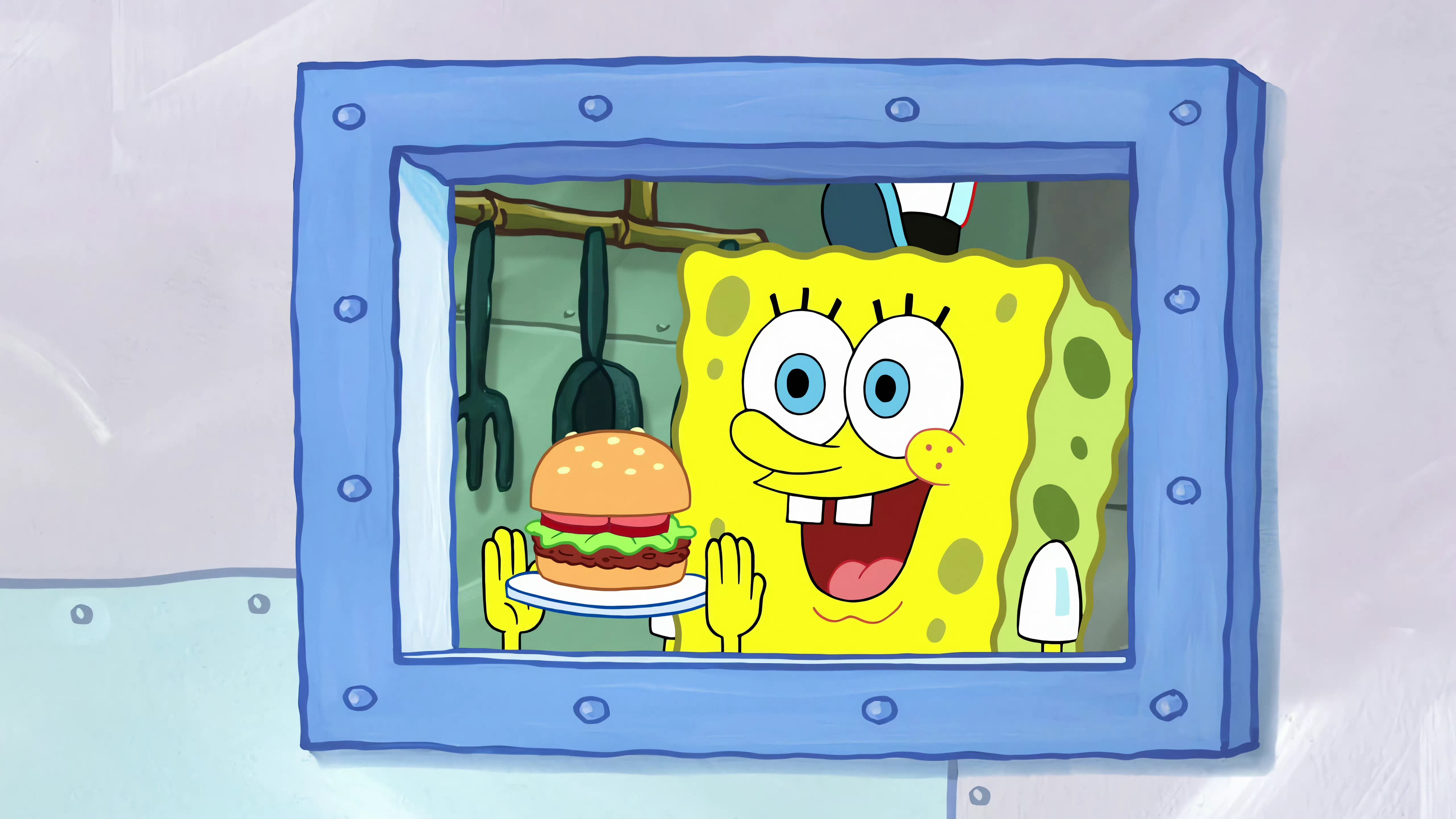 SpongeBob SquarePants holding a Krabby Patty HD Wallpaper