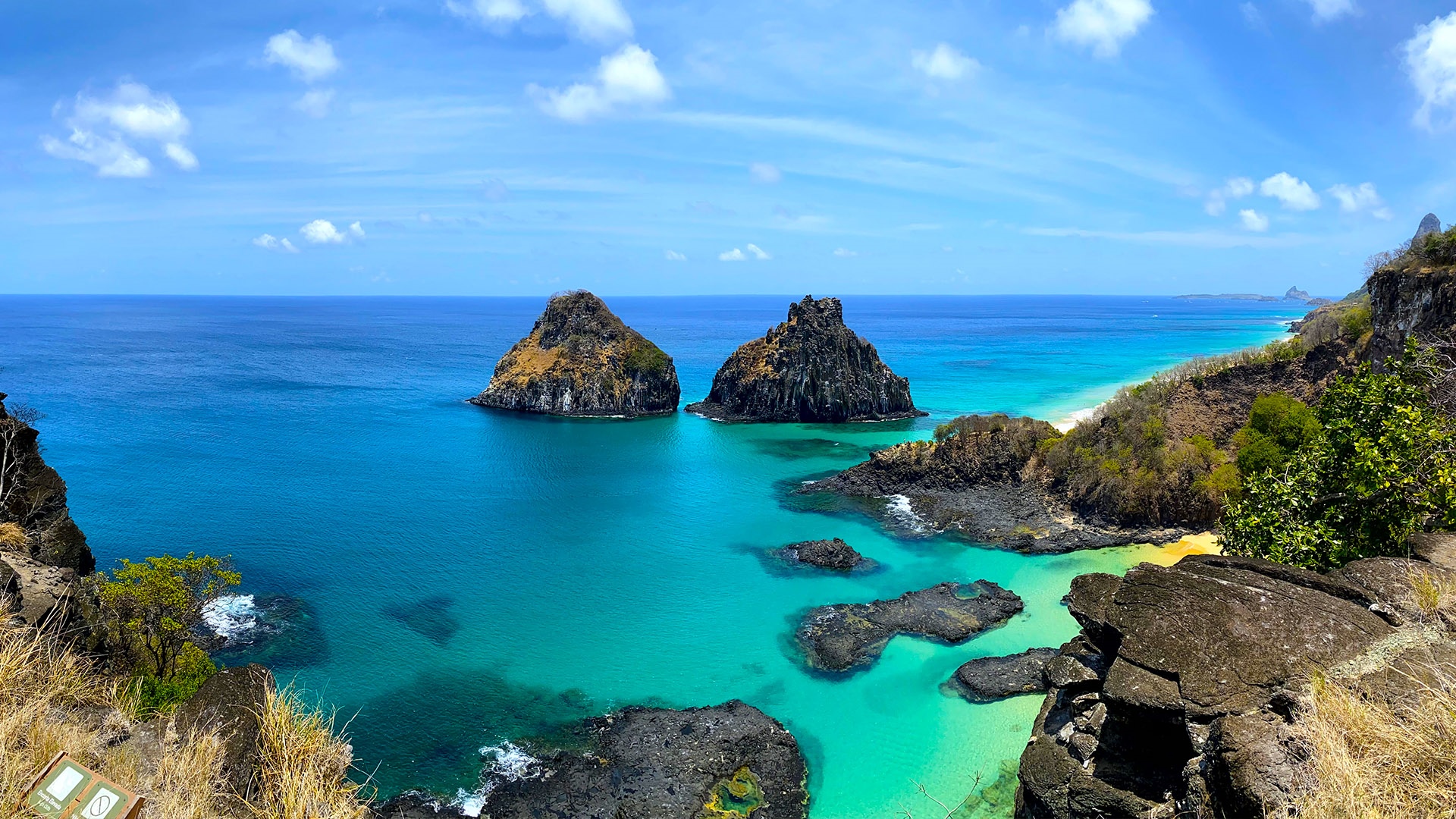 Two rocky islands in the turquoise waters of Fernando de Noronha, Brazil HD Wallpaper