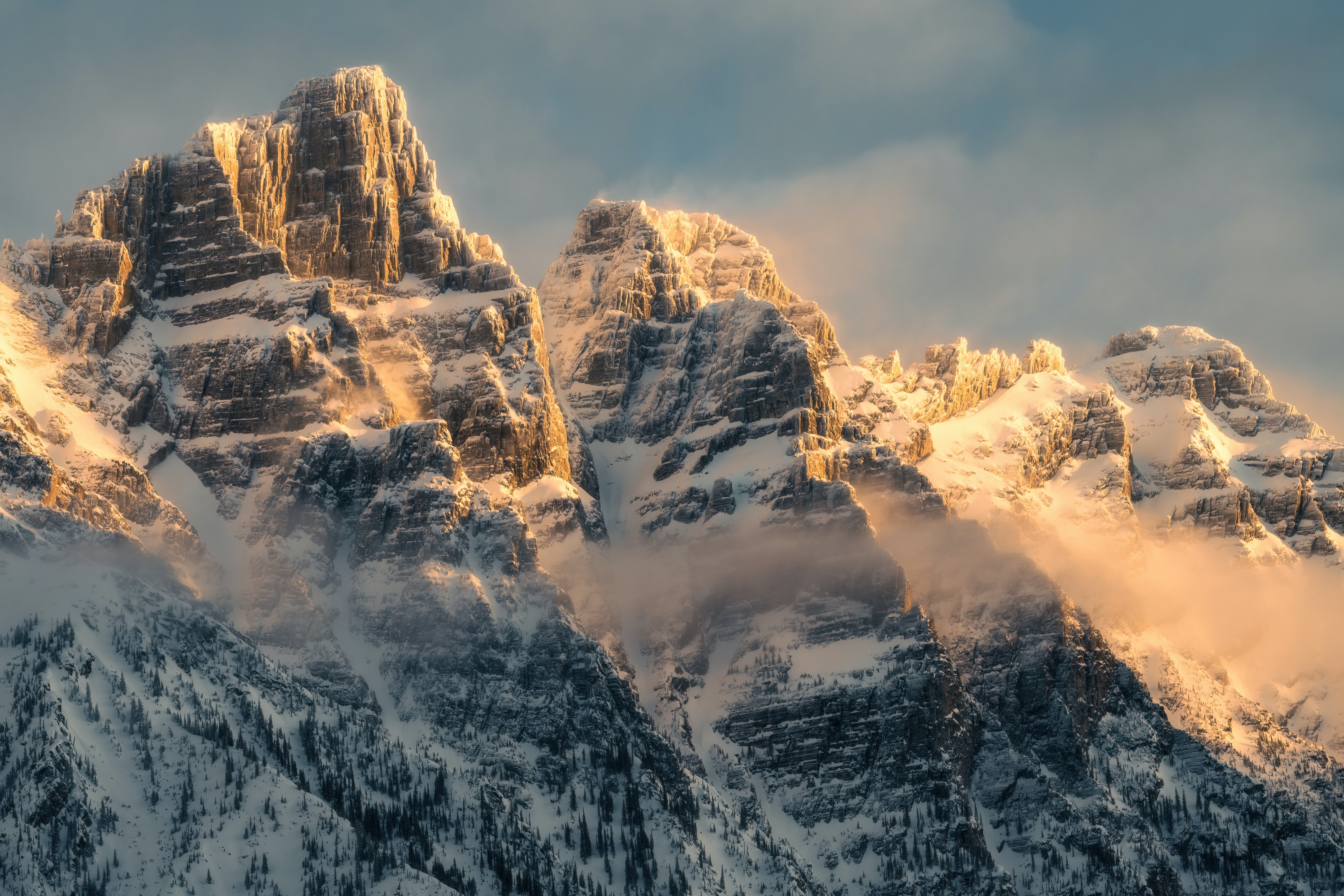Snow-covered mountains in Canada with mist HD Wallpaper