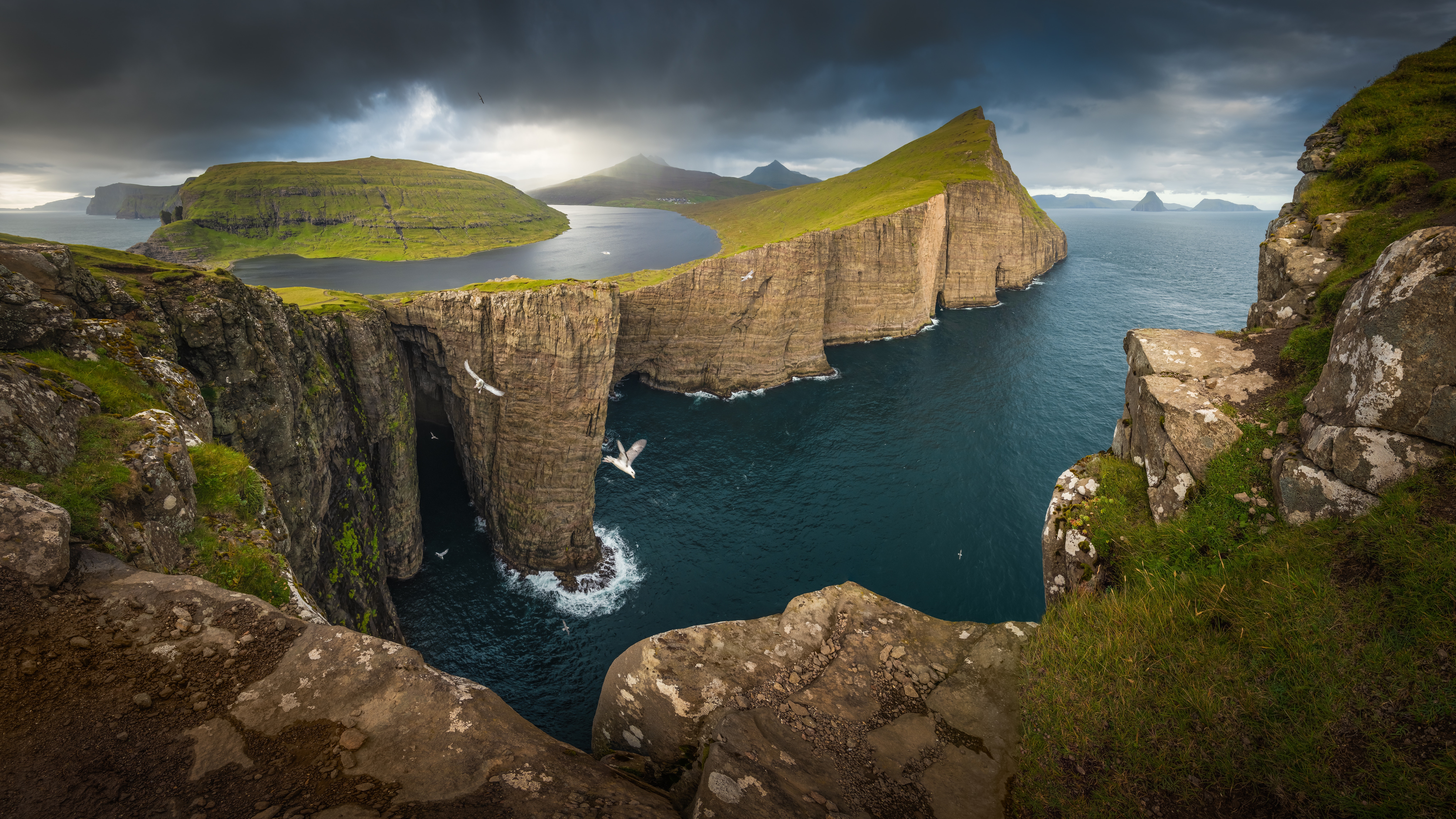 4K Faroe Islands cliffs and sea with birds HD Wallpaper