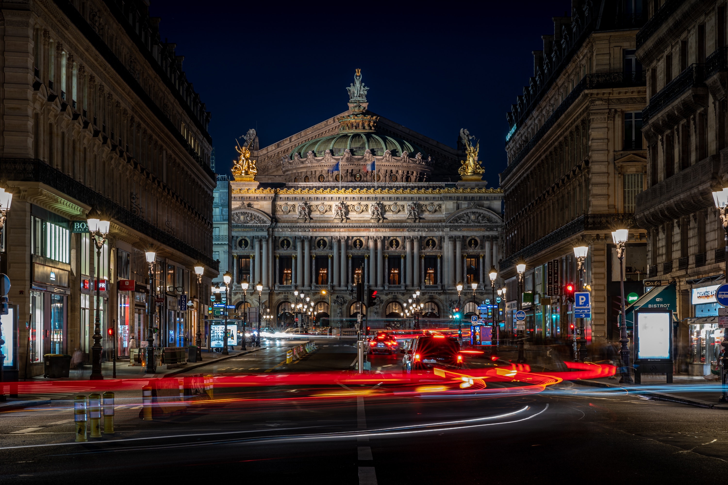 Palais Garnier Opera House at night in Paris with light trails HD Wallpaper