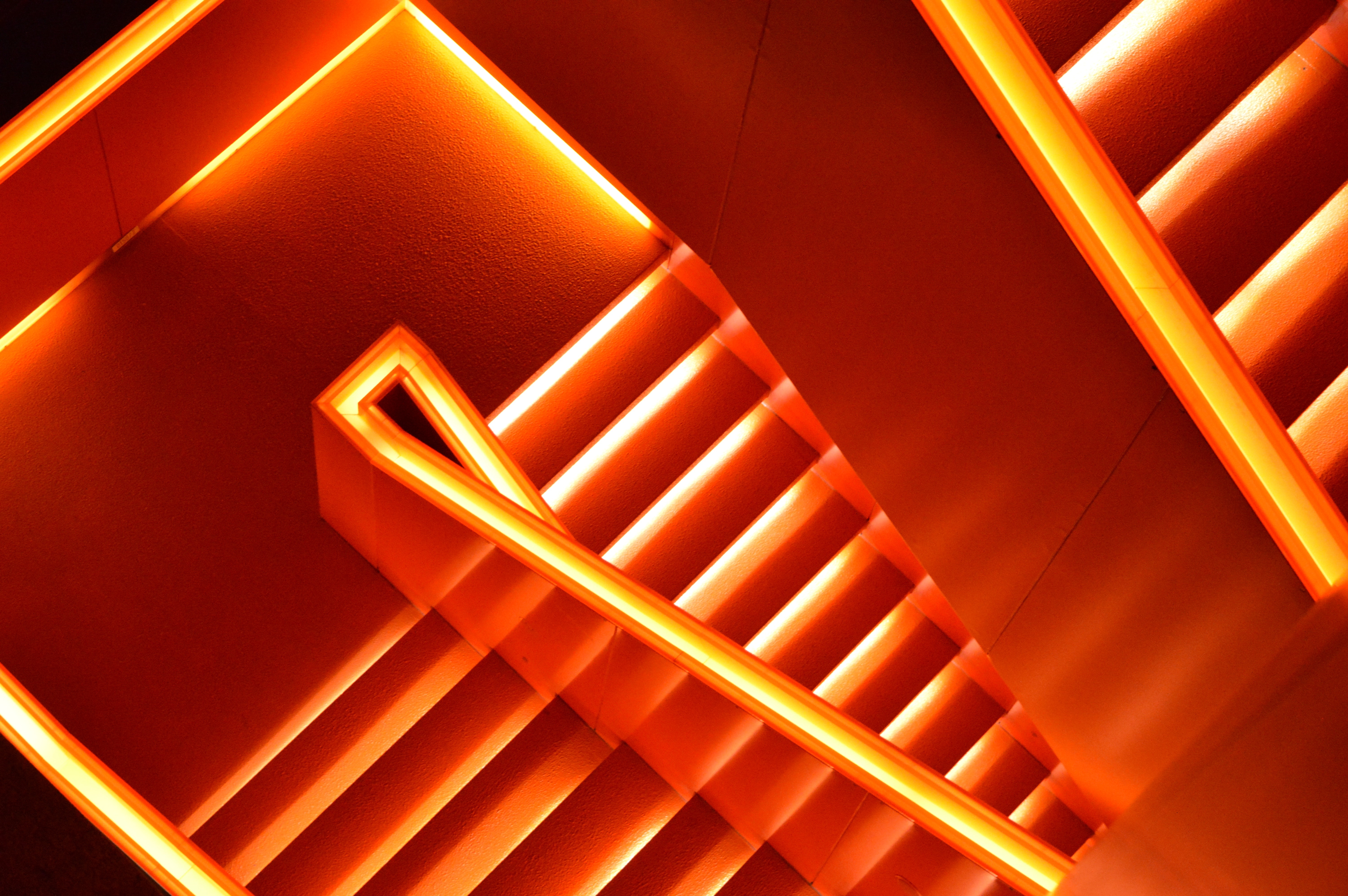 Orange illuminated staircase HD Wallpaper