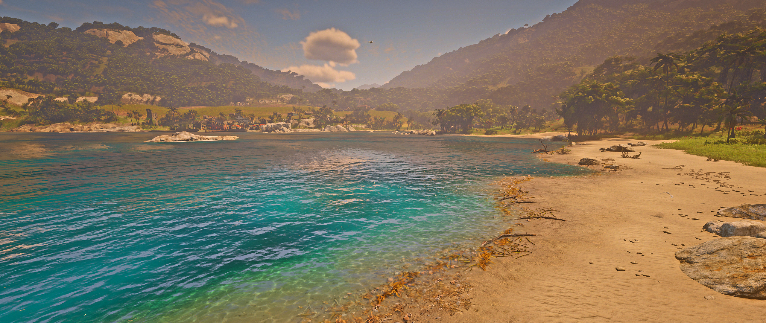 Tropical bay with mountains and a beach HD Wallpaper