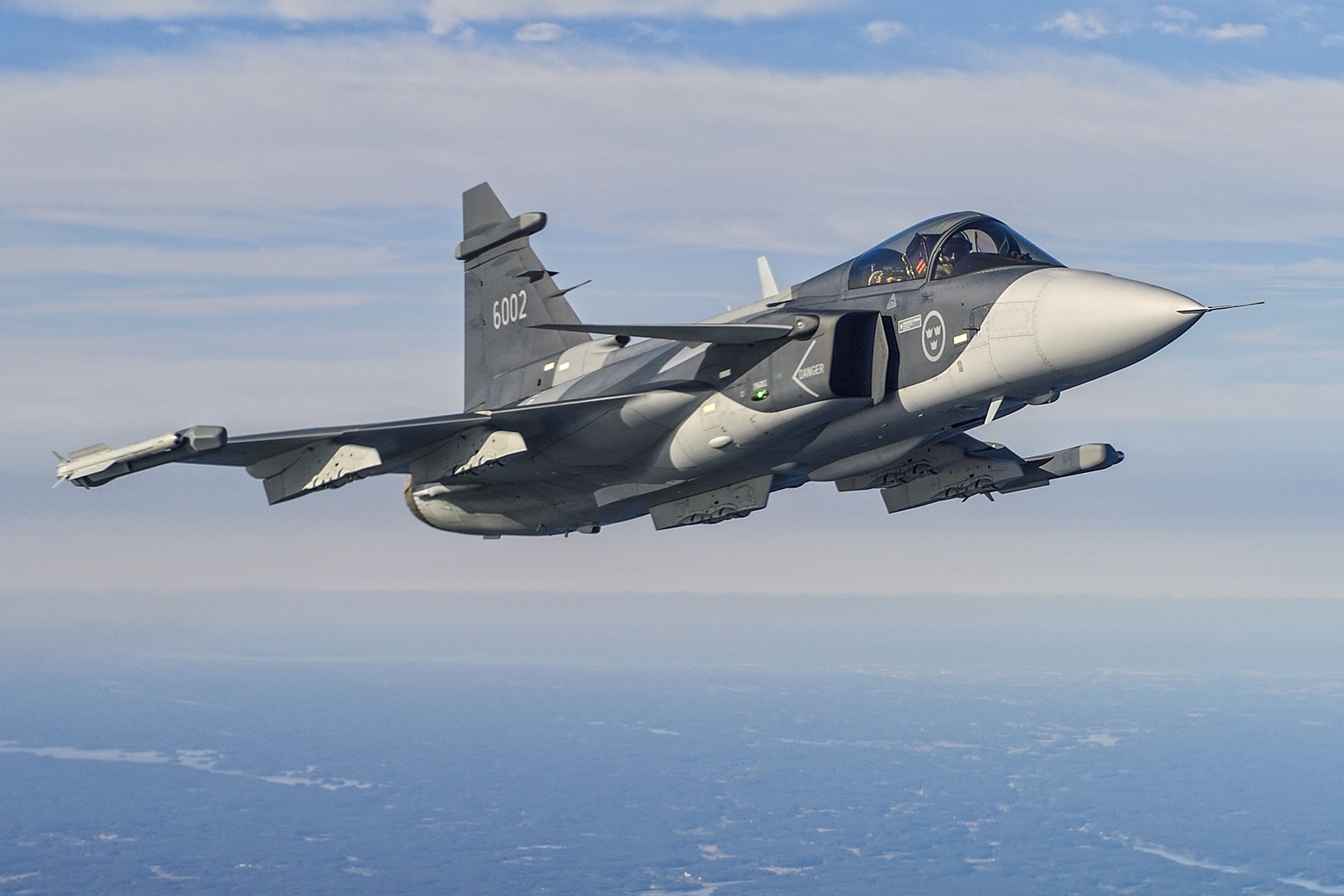 Swedish Air Force JAS-39 Gripen jet fighter in flight HD Wallpaper