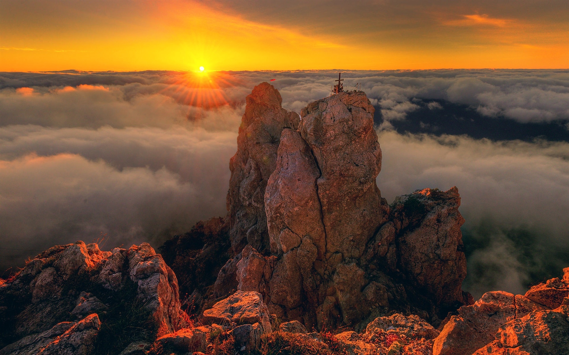Sunset over the clouds from Ai-Petri mountain in Crimea HD Wallpaper