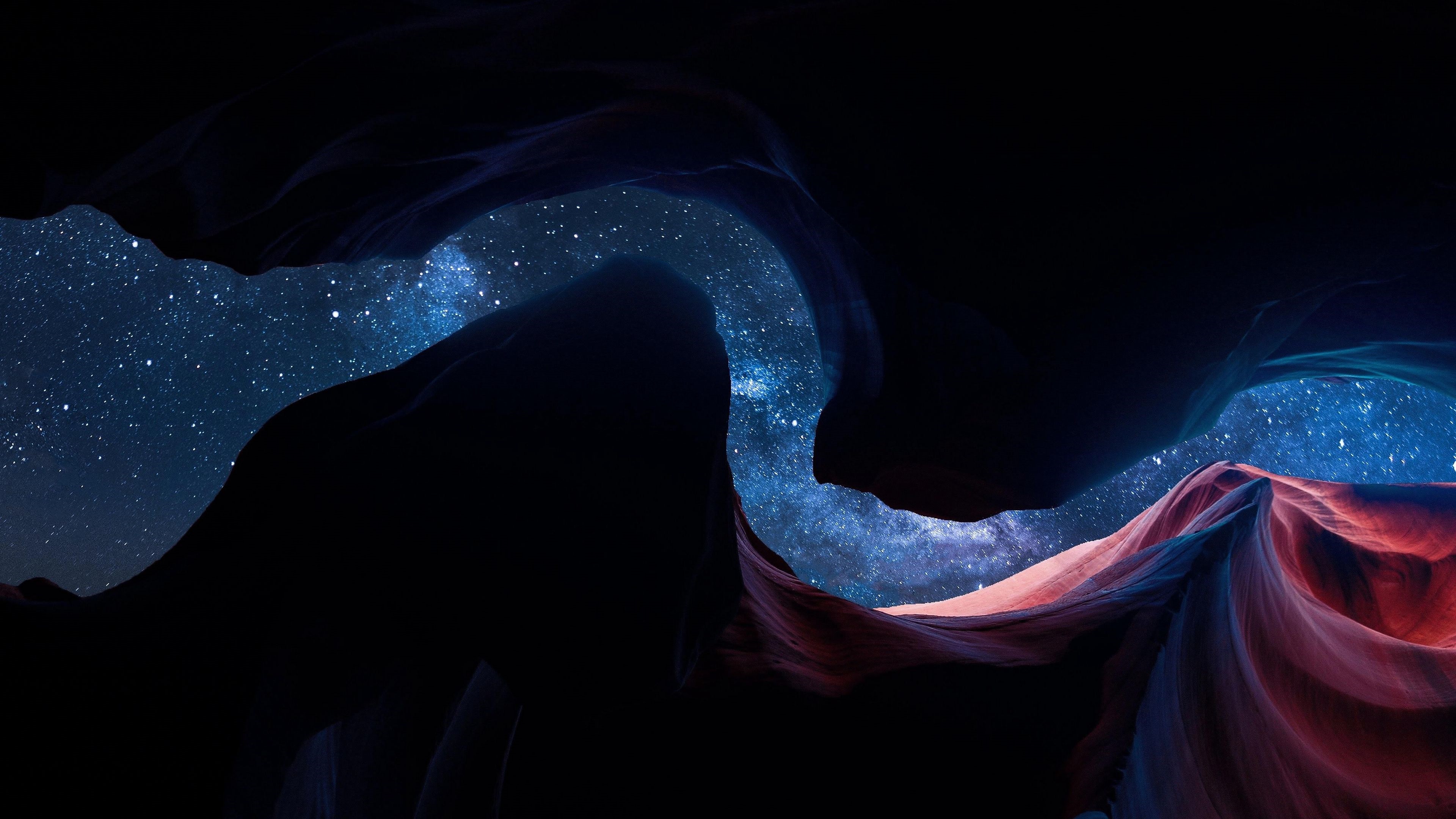 4K Curved Canyon Under a Starry Sky HD Wallpaper