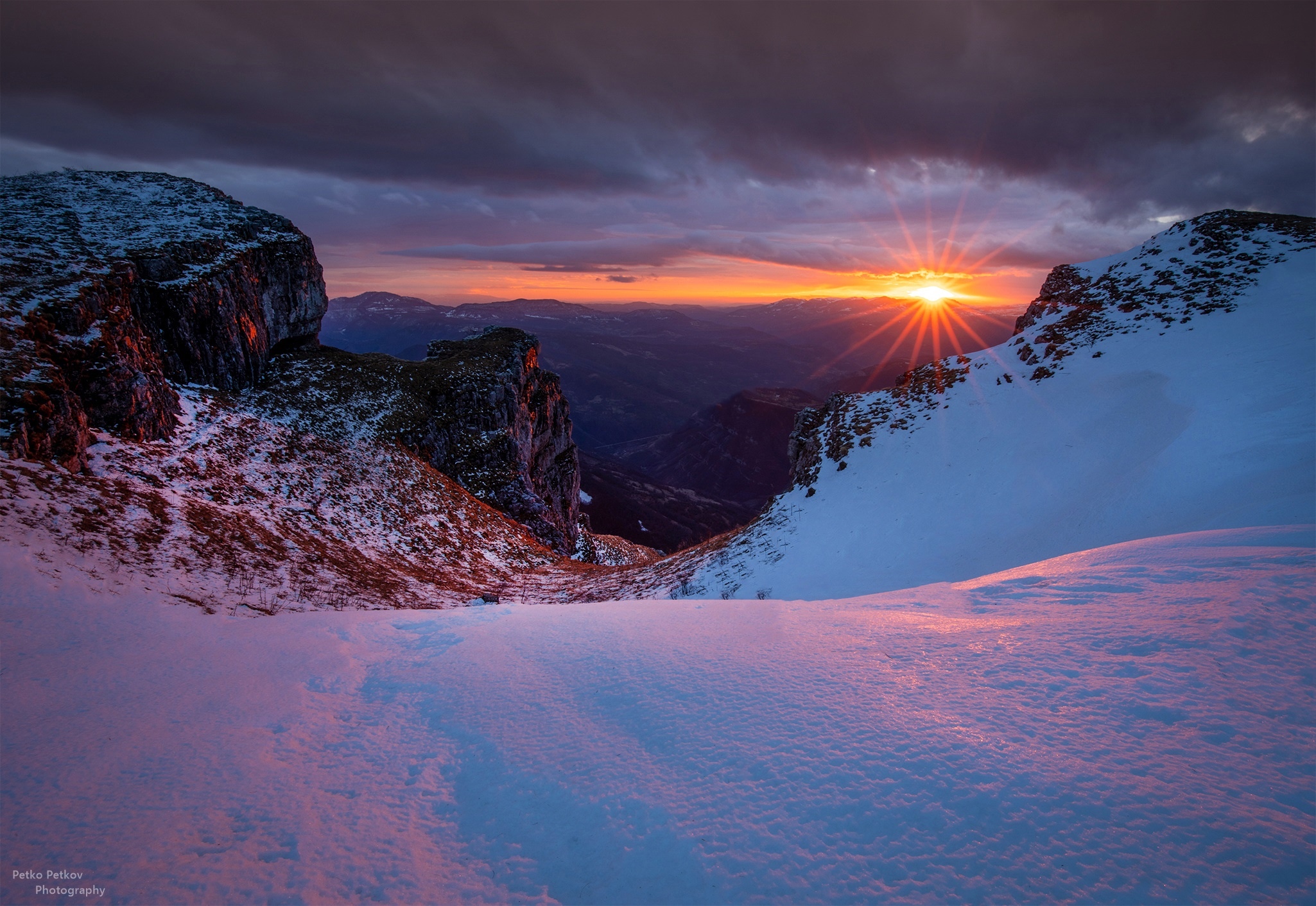 Sunset over snowy mountains and valley HD Wallpaper