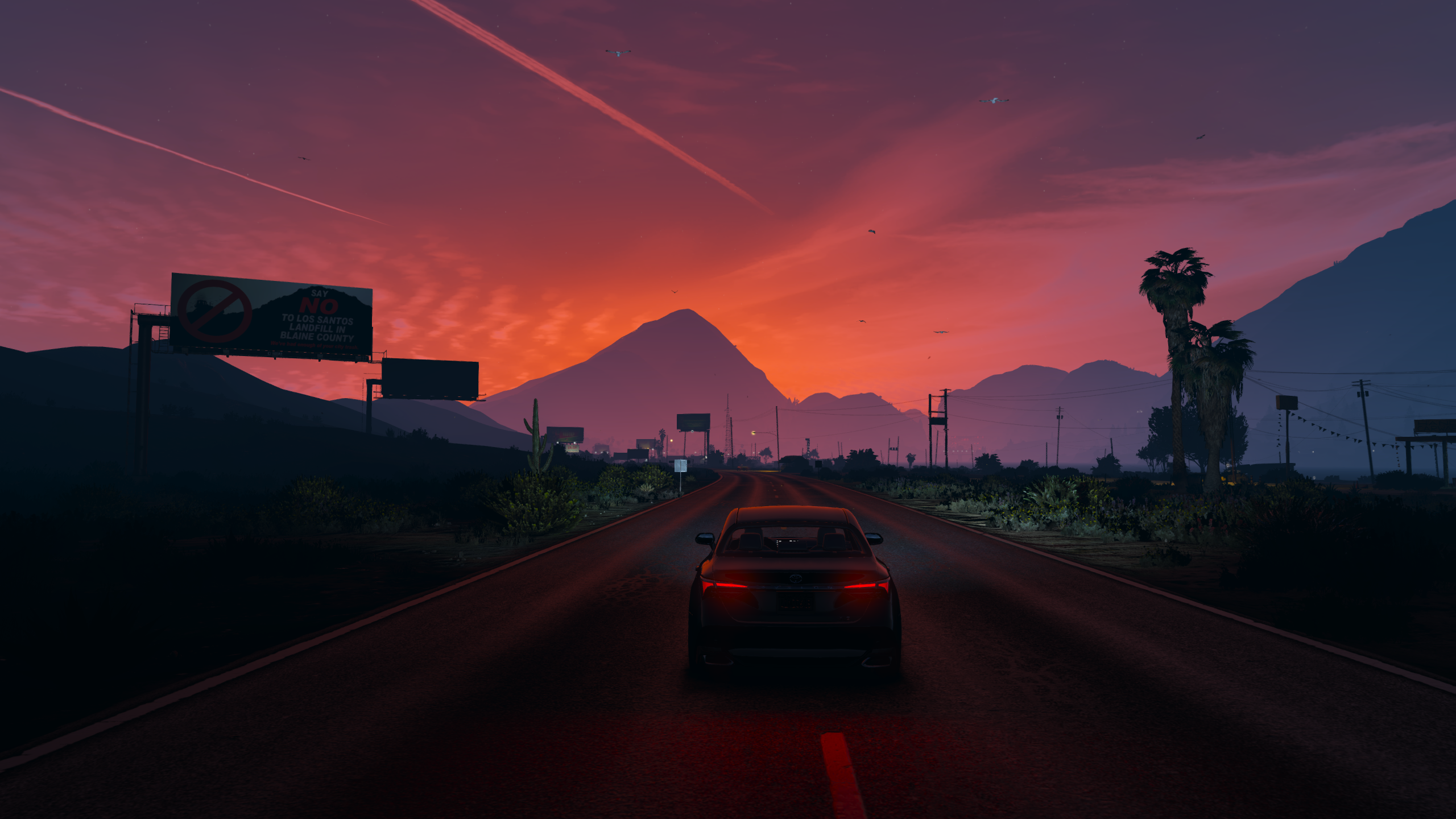 Car driving on a road during sunset in Grand Theft Auto V HD Wallpaper