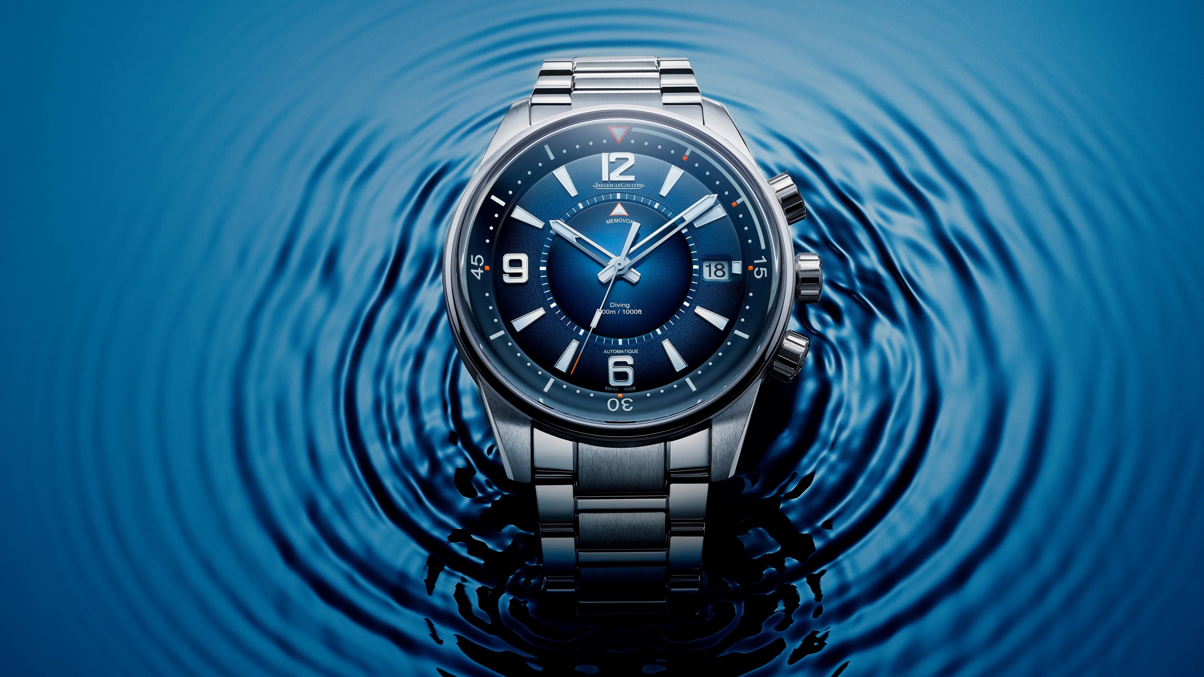 4K Jaeger LeCoultre wristwatch on blue water ripples HD Wallpaper