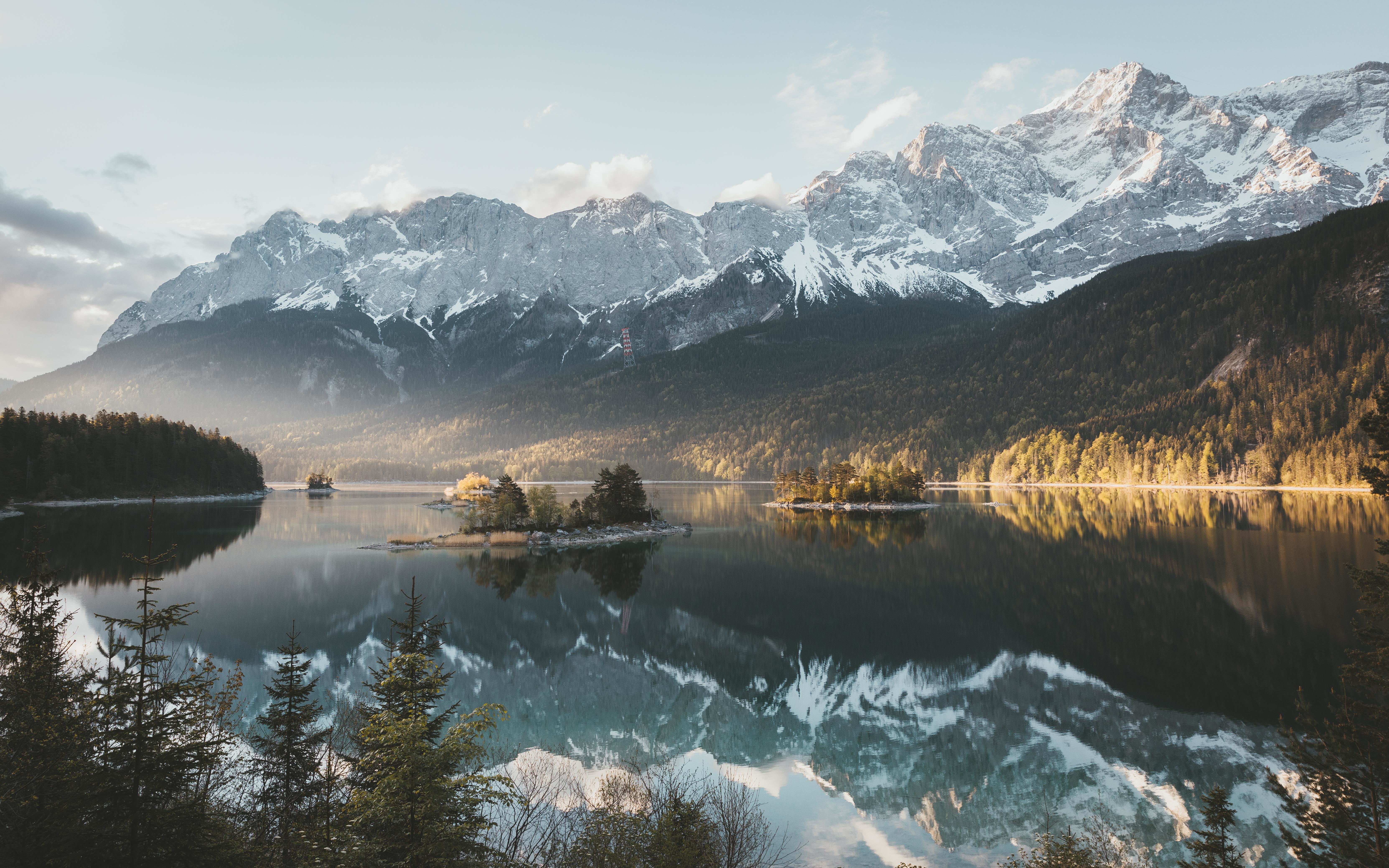 4K Lake Eibsee landscape with snow-capped mountains and reflection HD Wallpaper
