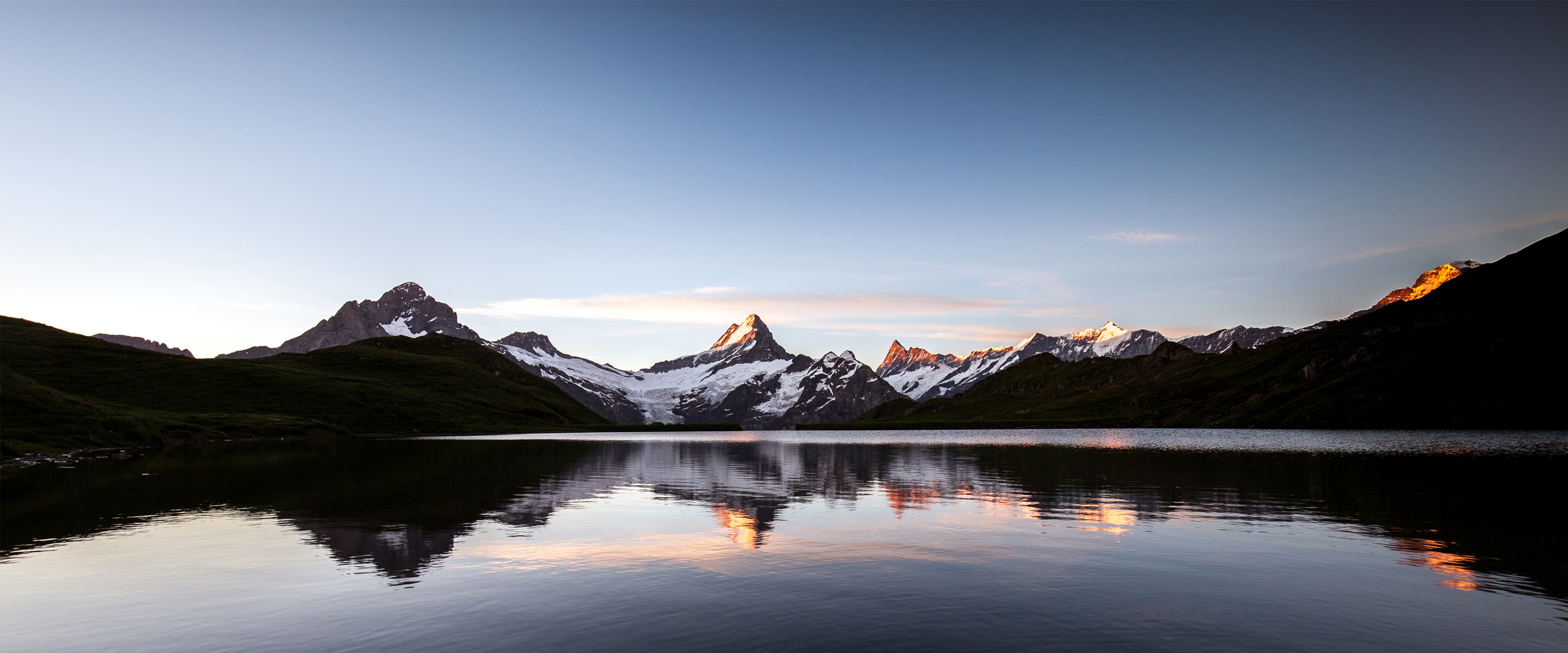 4K reflection of mountains in a lake at sunrise HD Wallpaper