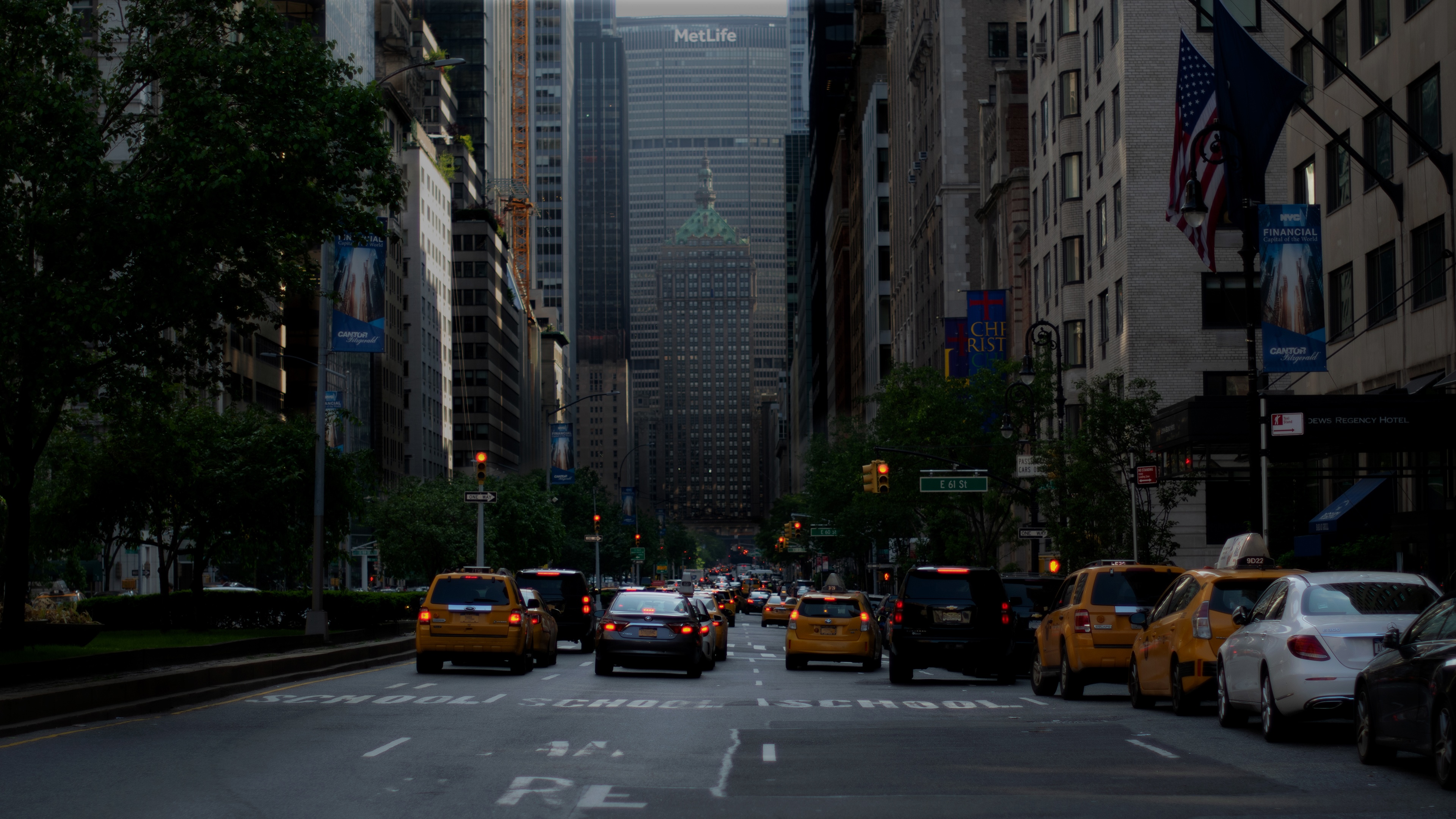 New York City street with taxis and skyscrapers HD Wallpaper