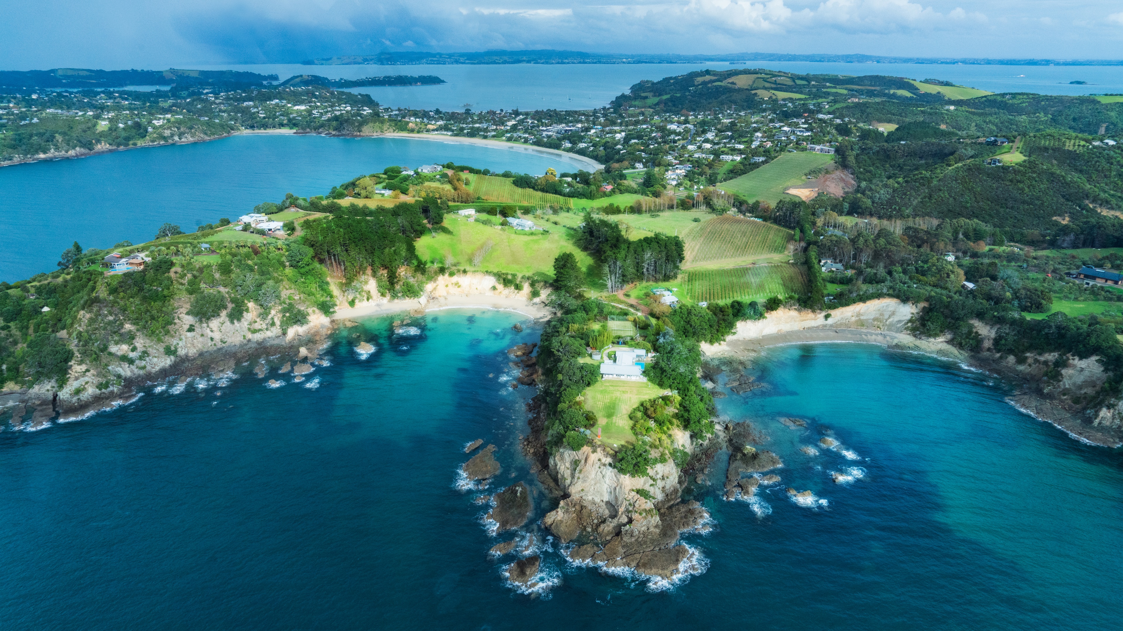4K aerial view of coastal landscape in New Zealand HD Wallpaper