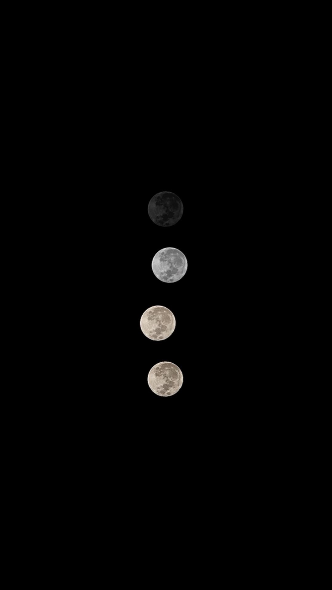Four moons in different phases on a black background HD Phone Wallpaper