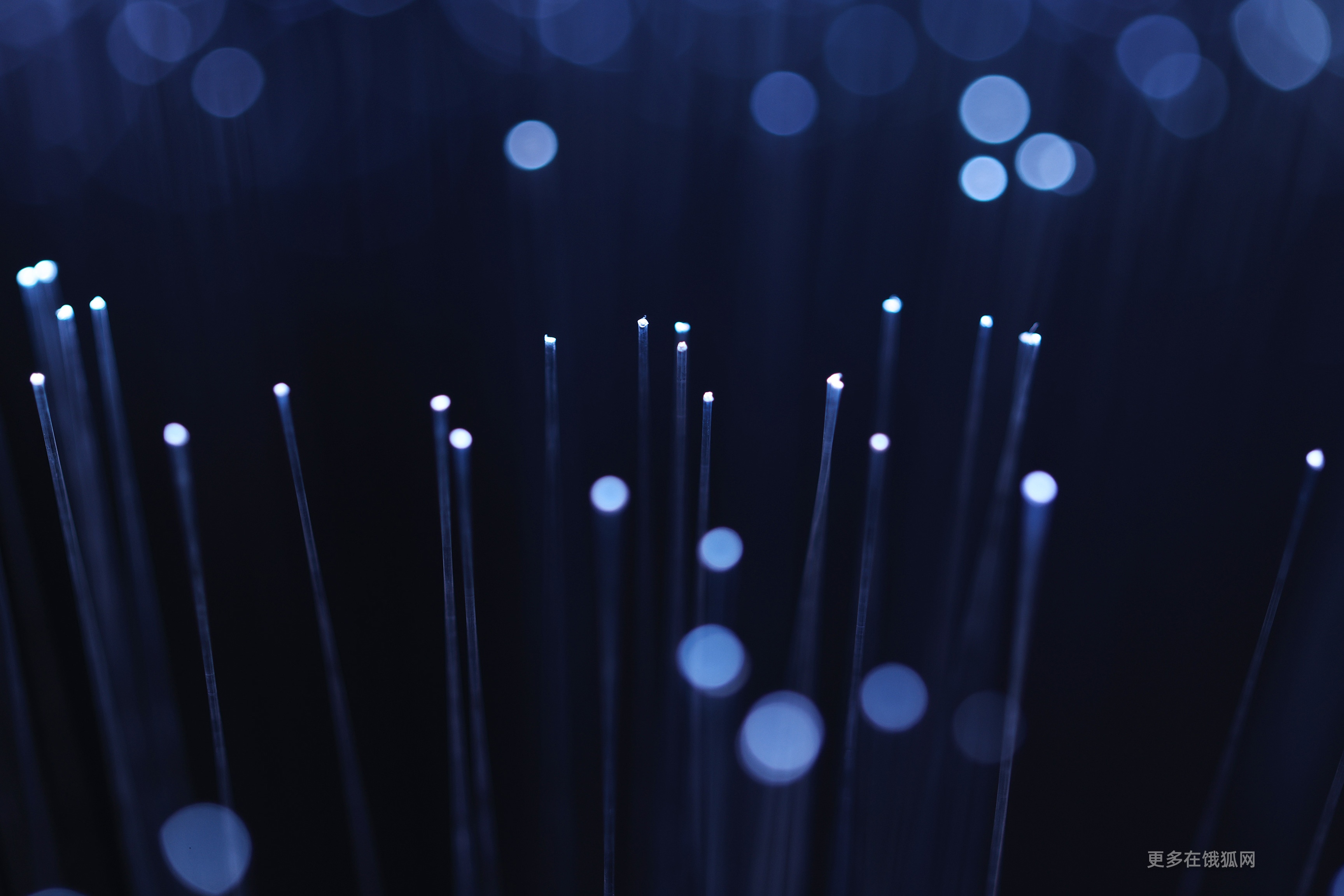 Abstract blue fiber optics with bokeh lights HD Wallpaper